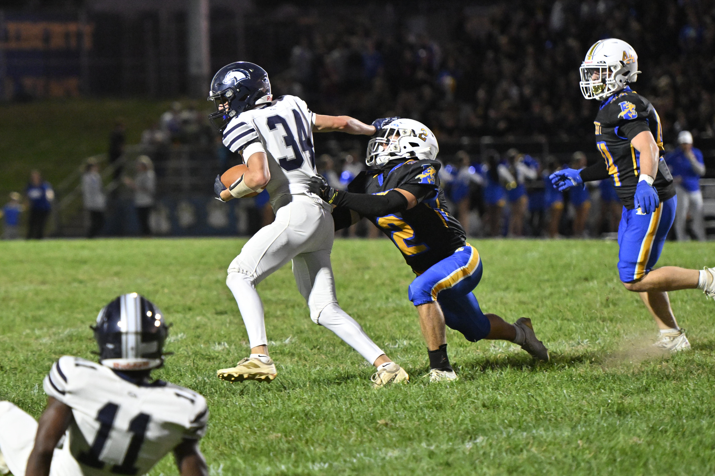Manchester Valley's Connor Stack is tackled by Charlie Frothingham during...