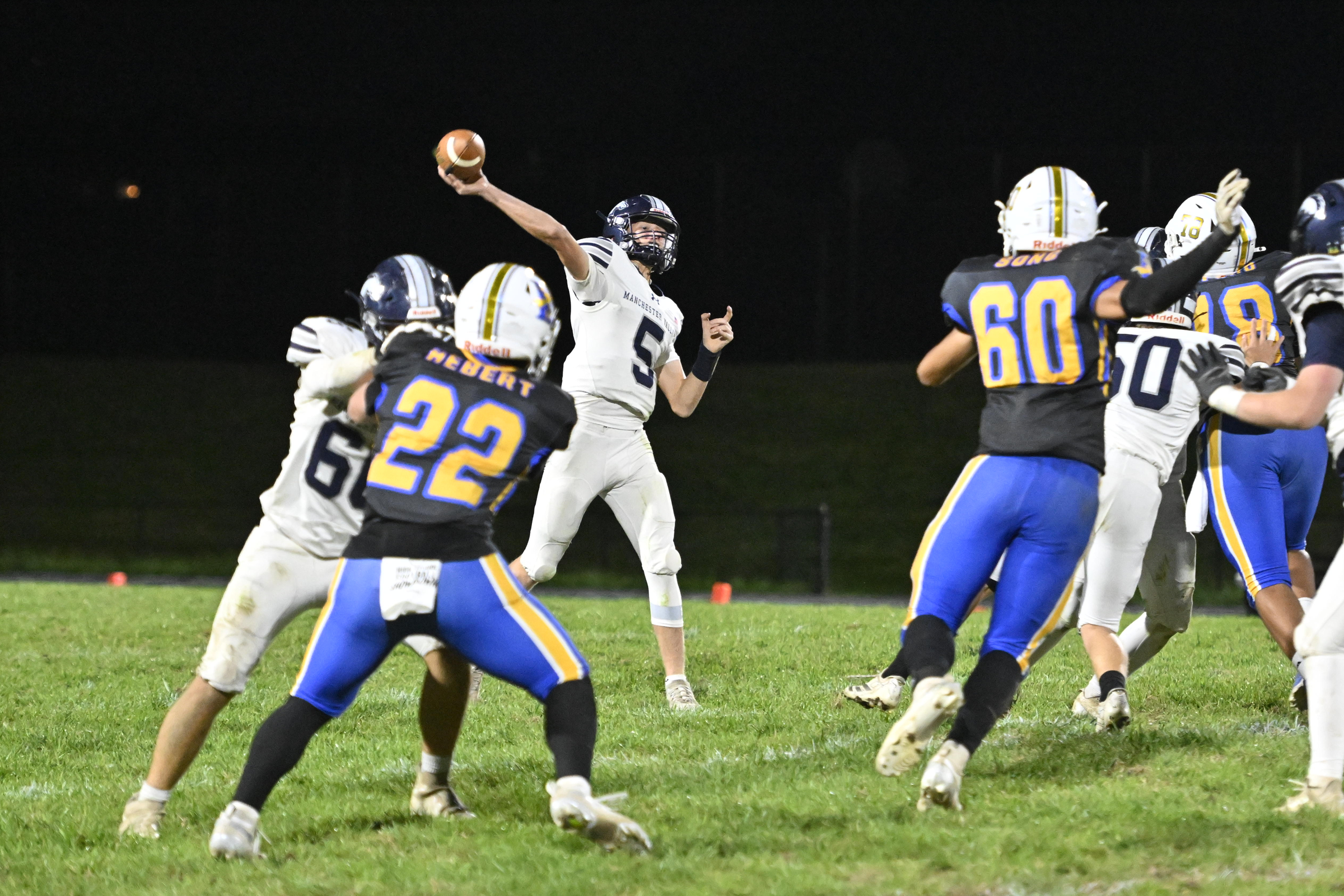 Manchester Valley's Beau Snell passes the ball during a football...
