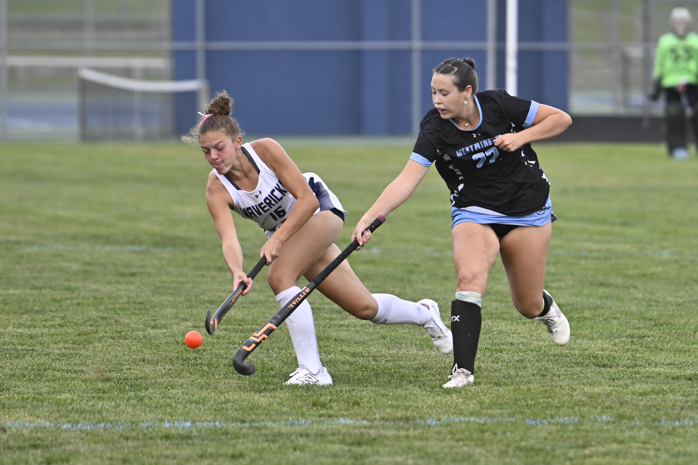 Manchester Valley's Isabella Miller passes the ball as Westminster's Abby...