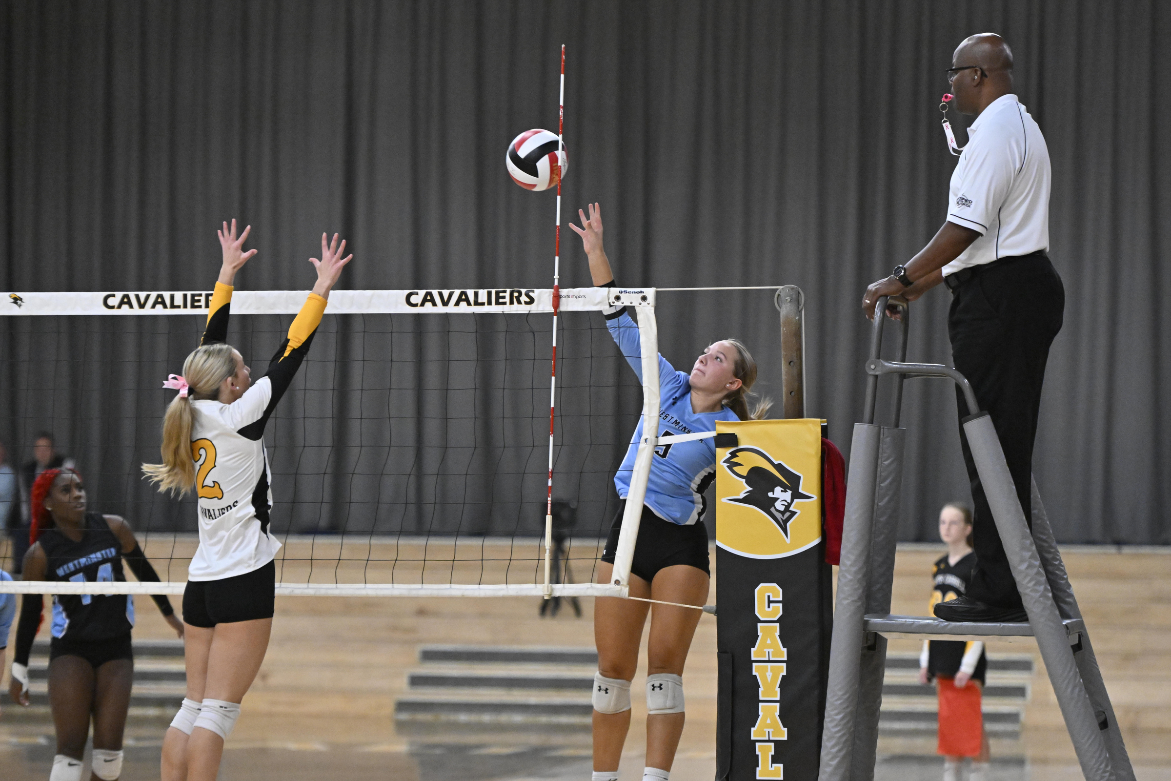 Westminster's Gabby Zajaczkowski hits the ball over Erin Taylor during...