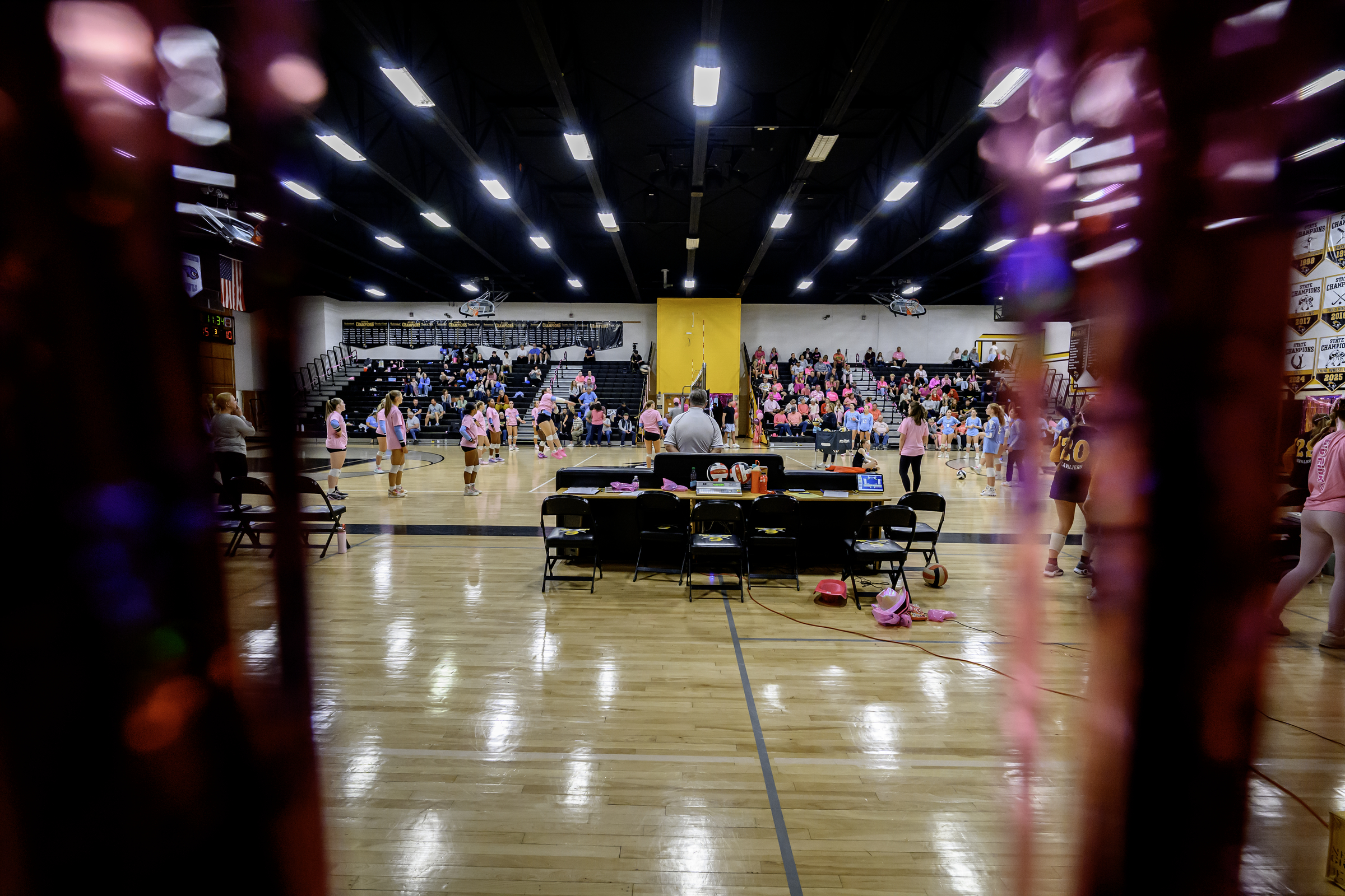 Pink shirts fill the gym in honor of Breat Cancer...