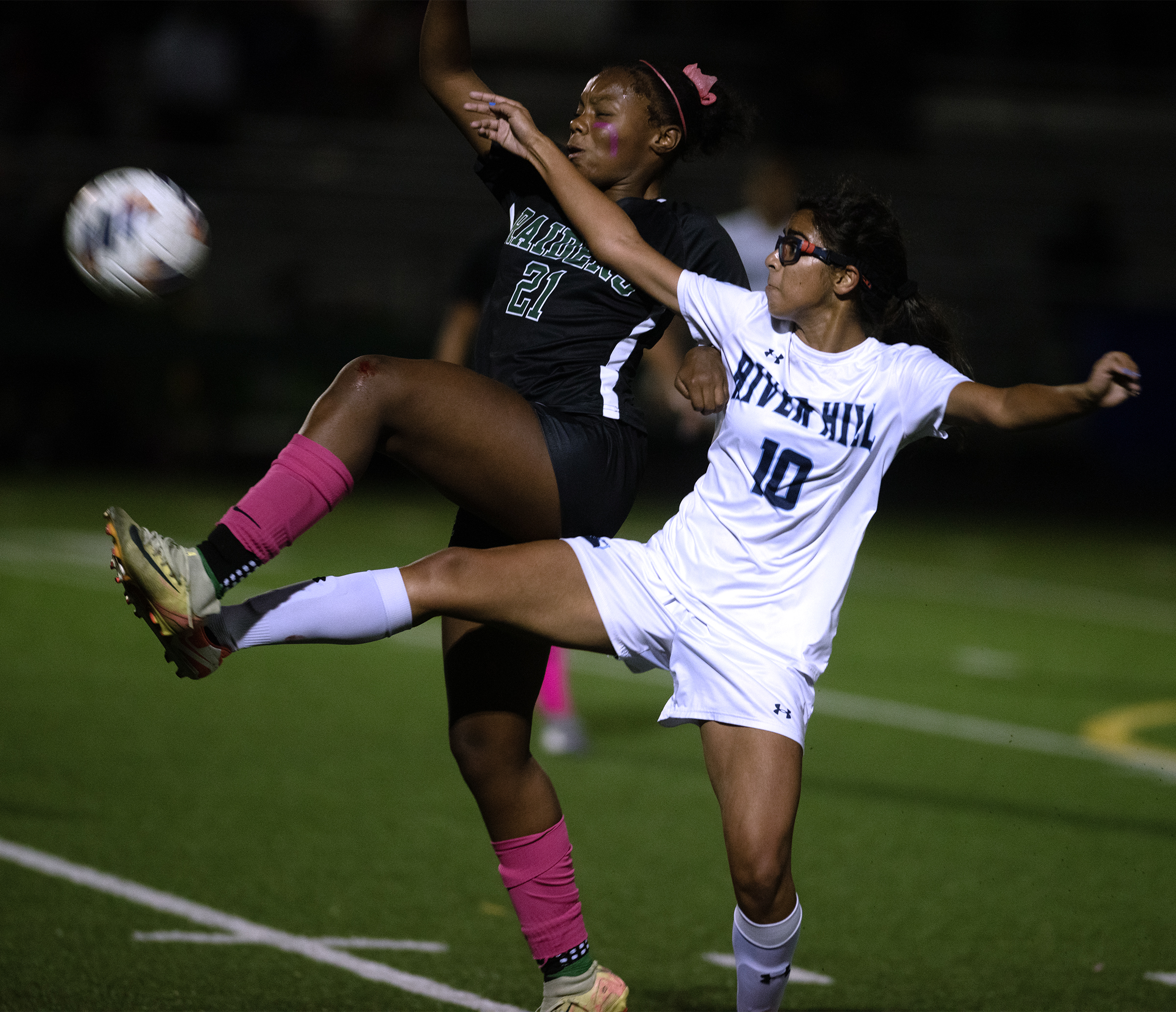Oct. 14, 2025- Atholton's Kennedy Snell, left, and River Hill's...