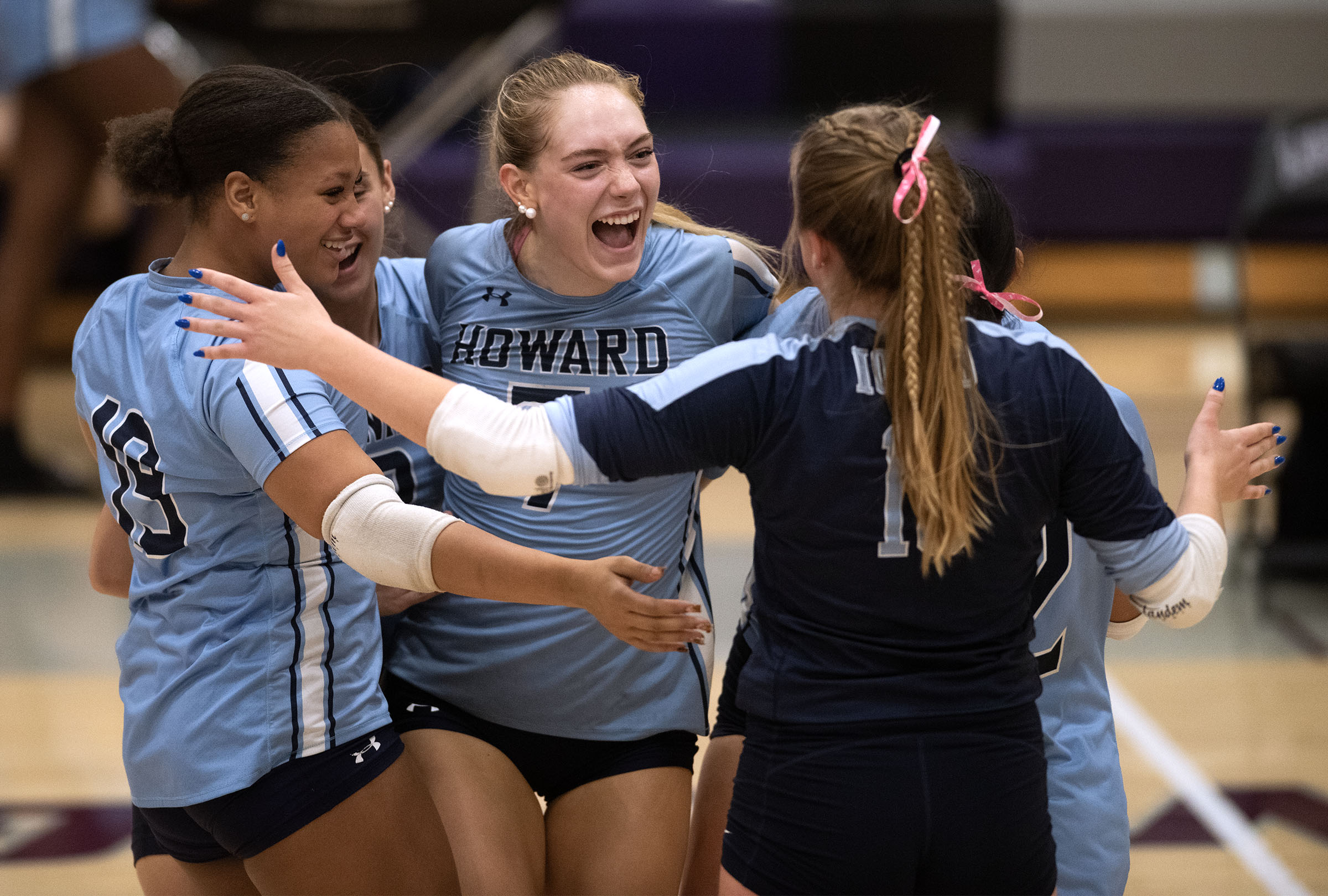 Oct. 6, 2025-Howard's Mariska Ordonez, center, celebrates a point against...