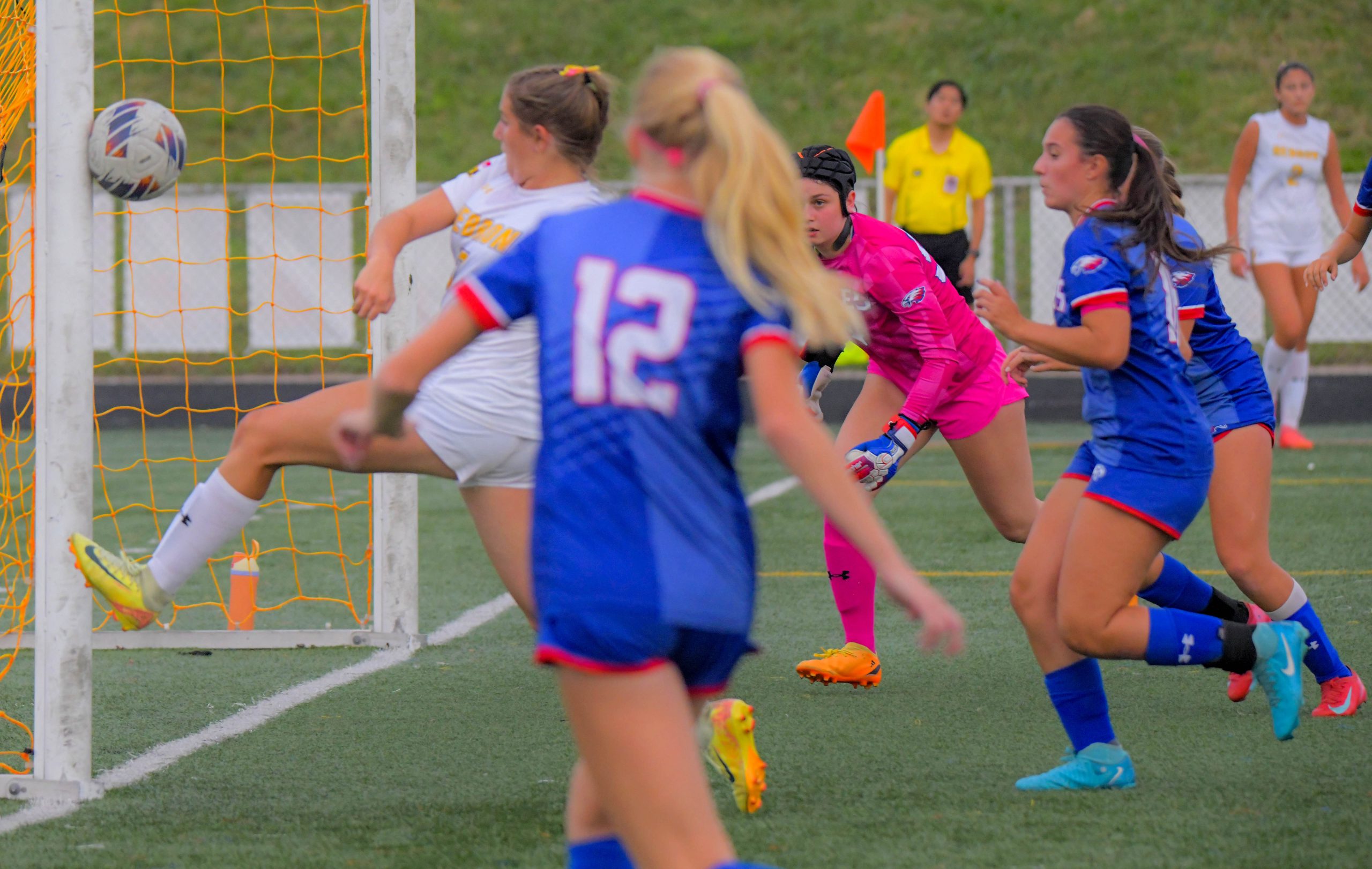 Centennial Eagles goalkeeper Chitra Sullivan, right watches as Mount Hebron...