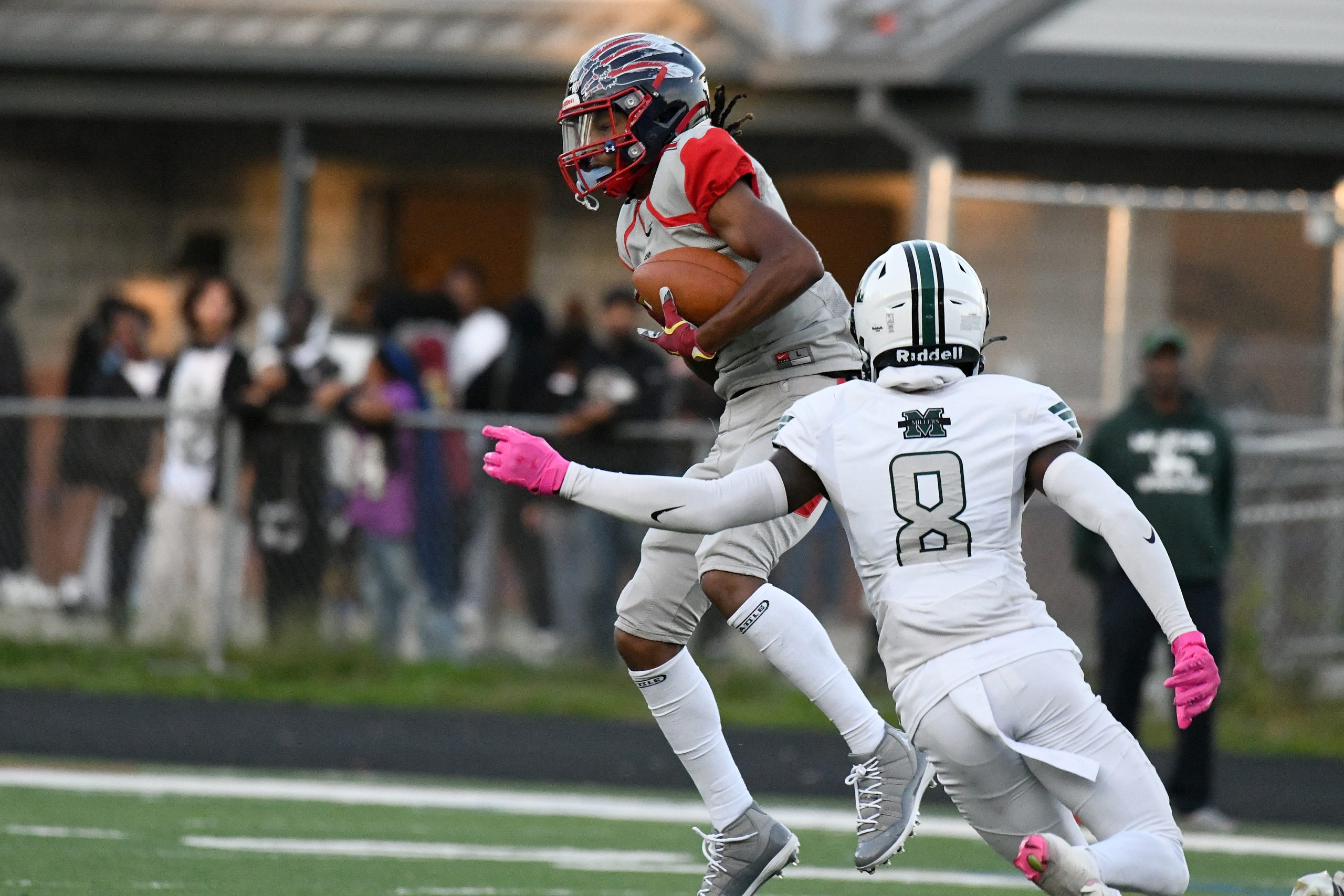 Jayen Newman, Franklin, makes a catch in front of Ky’ree...