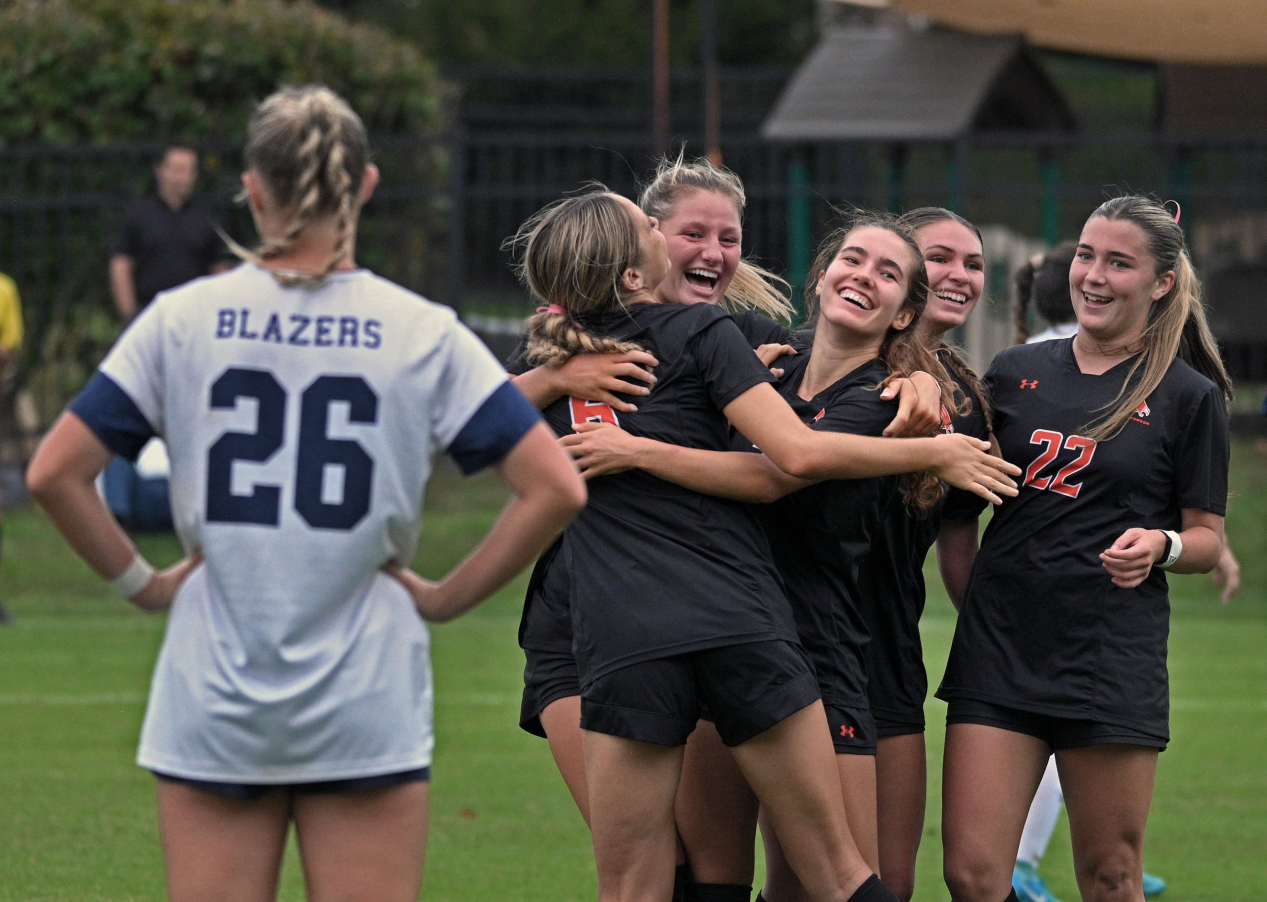 Mcdonogh’s Zoe Lilly-Vidal, center, celebrates her goal against NDP with...