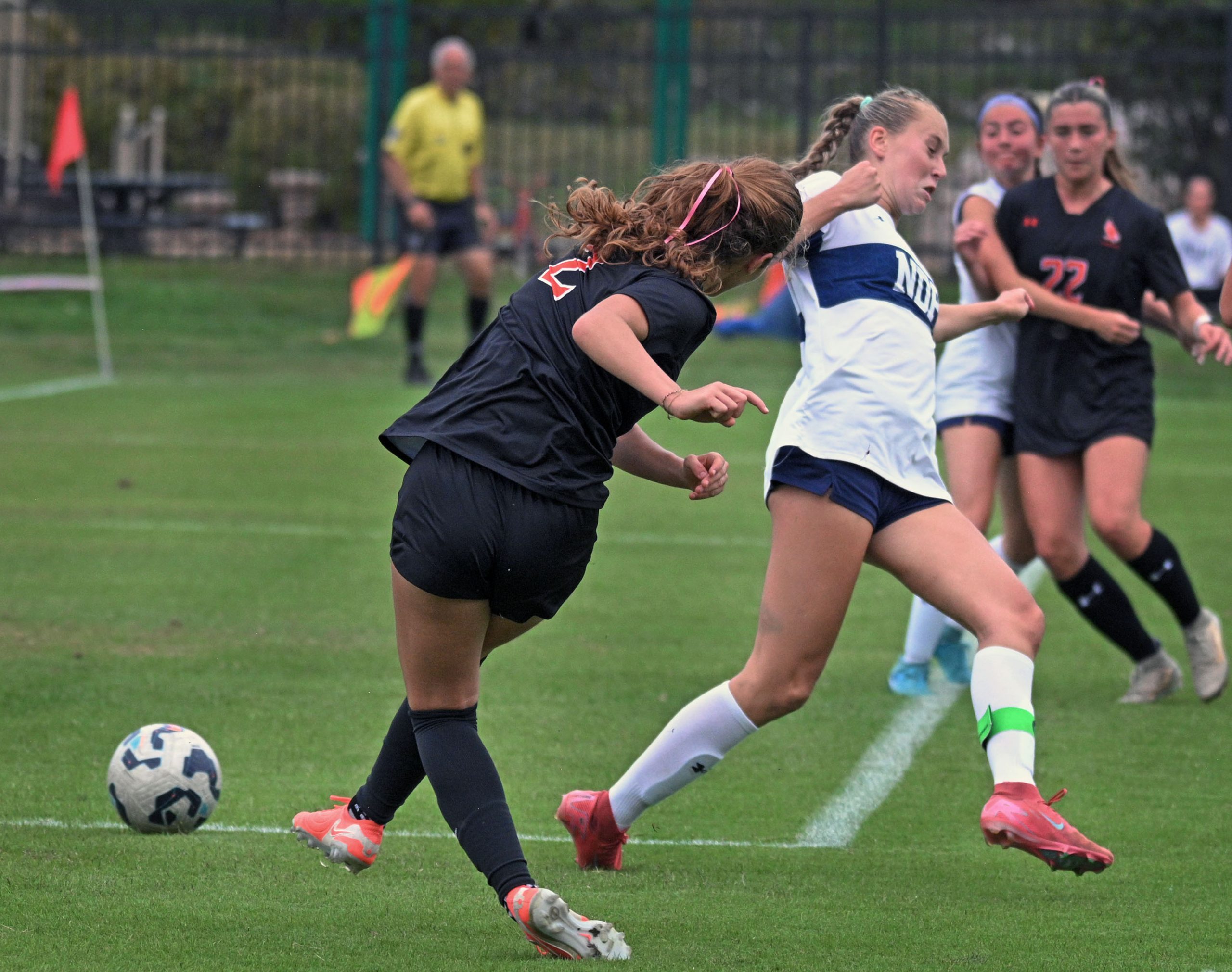 Mcdonogh’s Zoe Lilly-Vidal, left, shoots and scores against NDP’s Aubree...