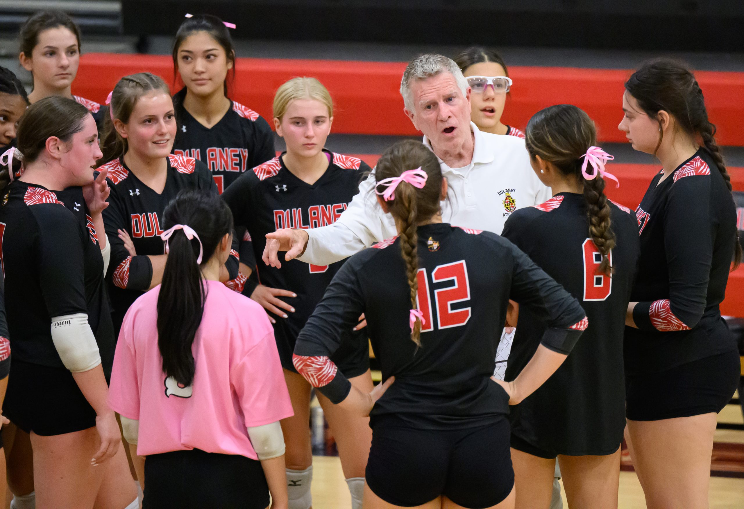 Dulaney head coach Cary Lyon leads his team against Hereford...