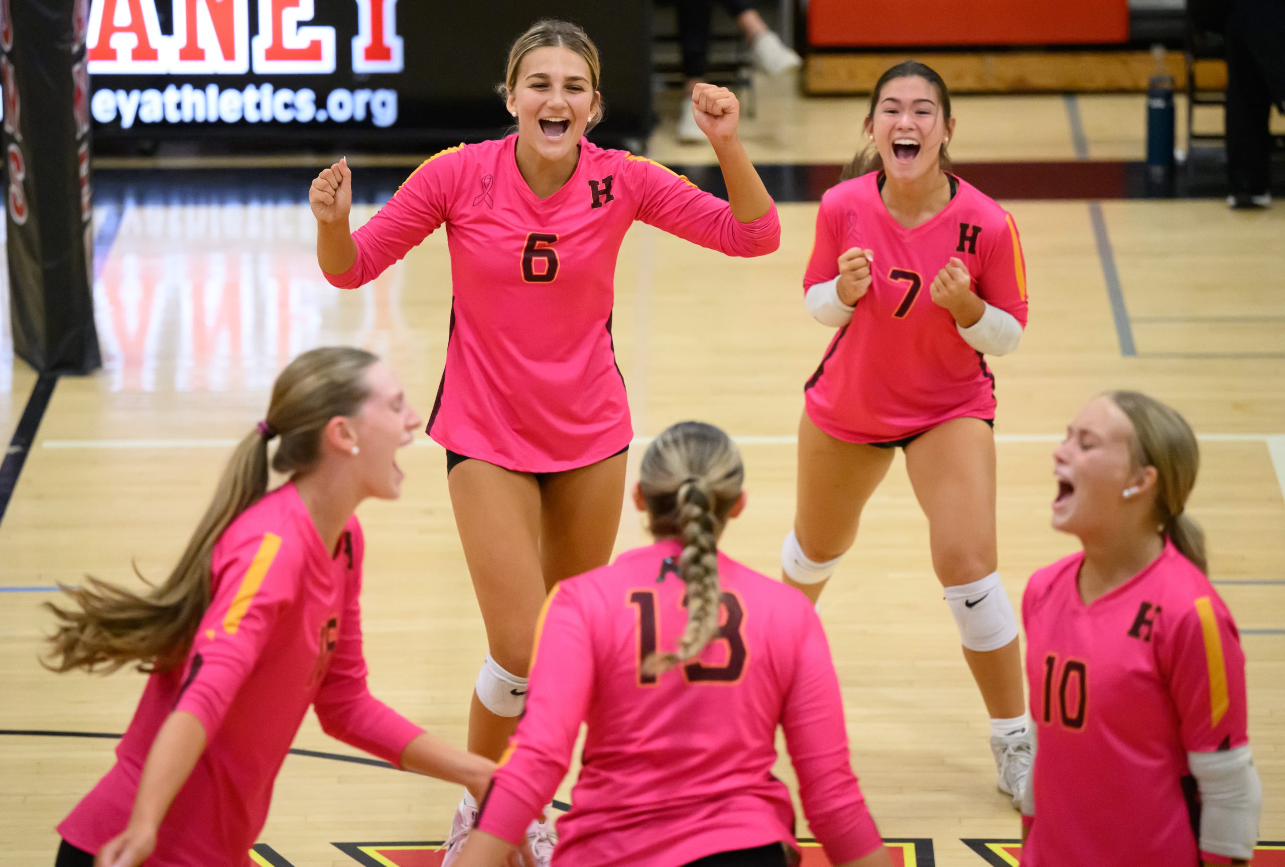 Hereford’s Soph Kefi, #6, and Tessa Brinton, #7, celebrate with...
