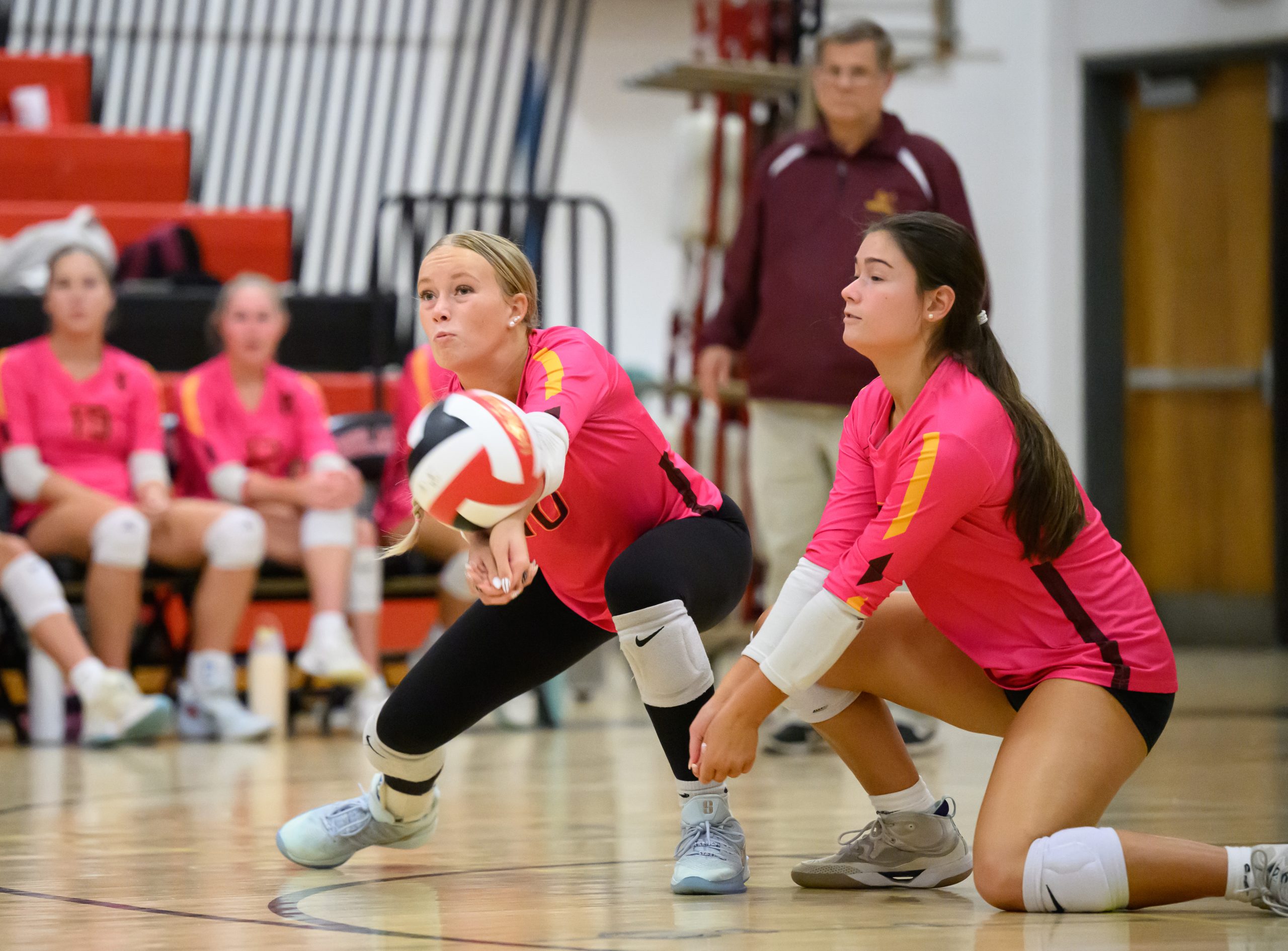 Hereford’s Brynn Hendrix, left, and Tessa Brinton lunge for a...