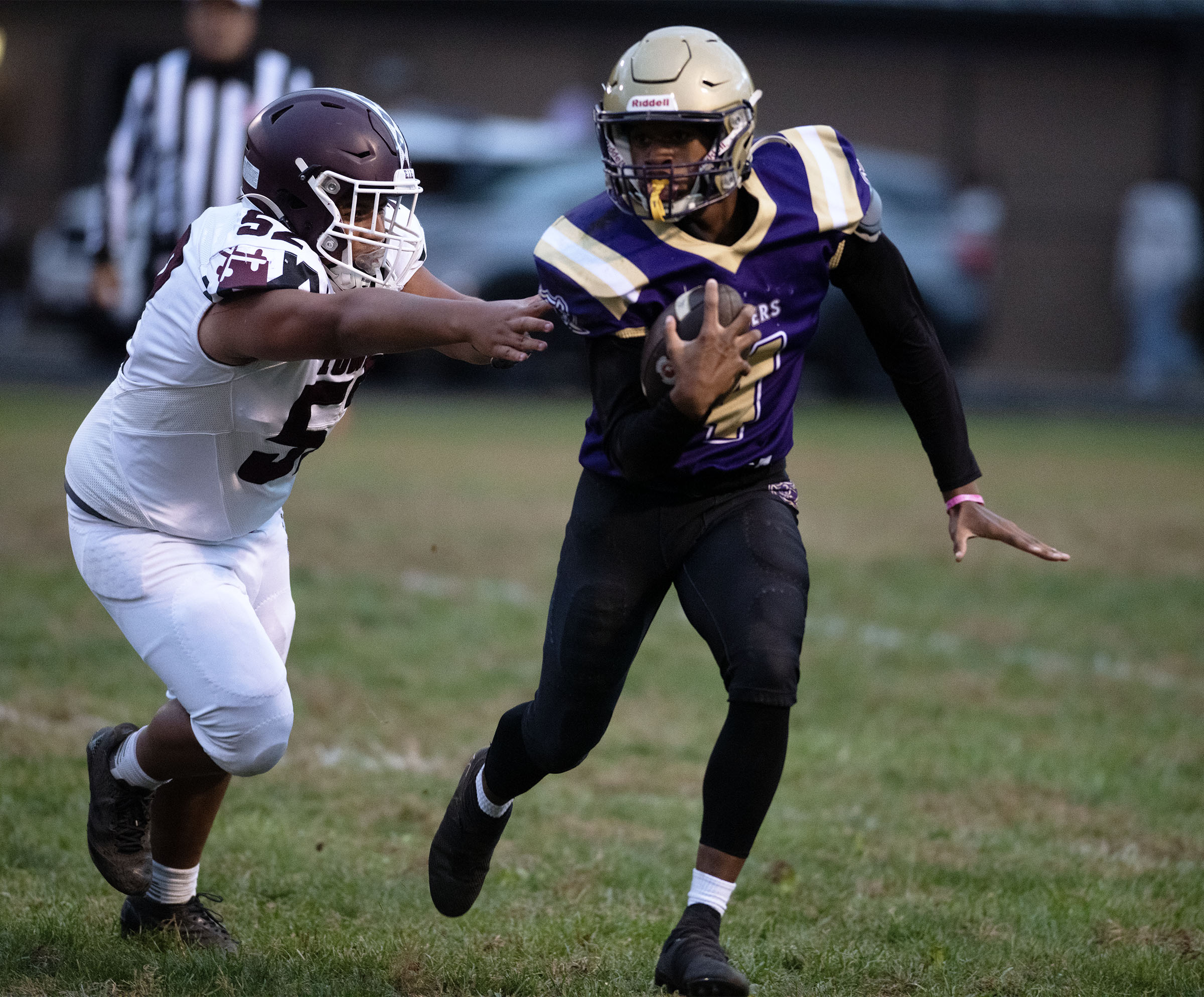 Oct. 10, 2025- Loch Raven quarterback Darrien Carter carries the...