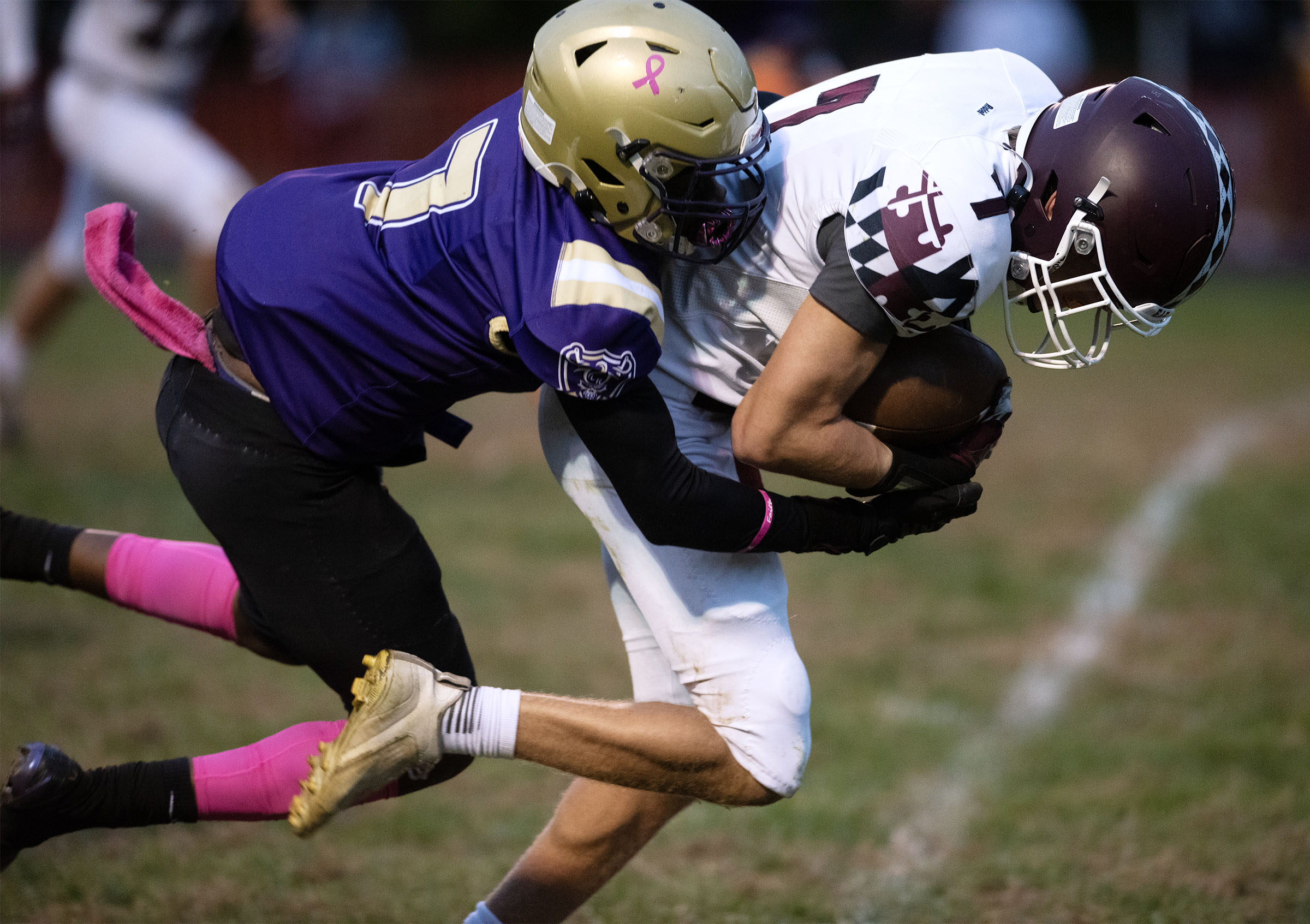 Oct. 10, 2025- Towson's Hudson Arrup is tackled by Loch...