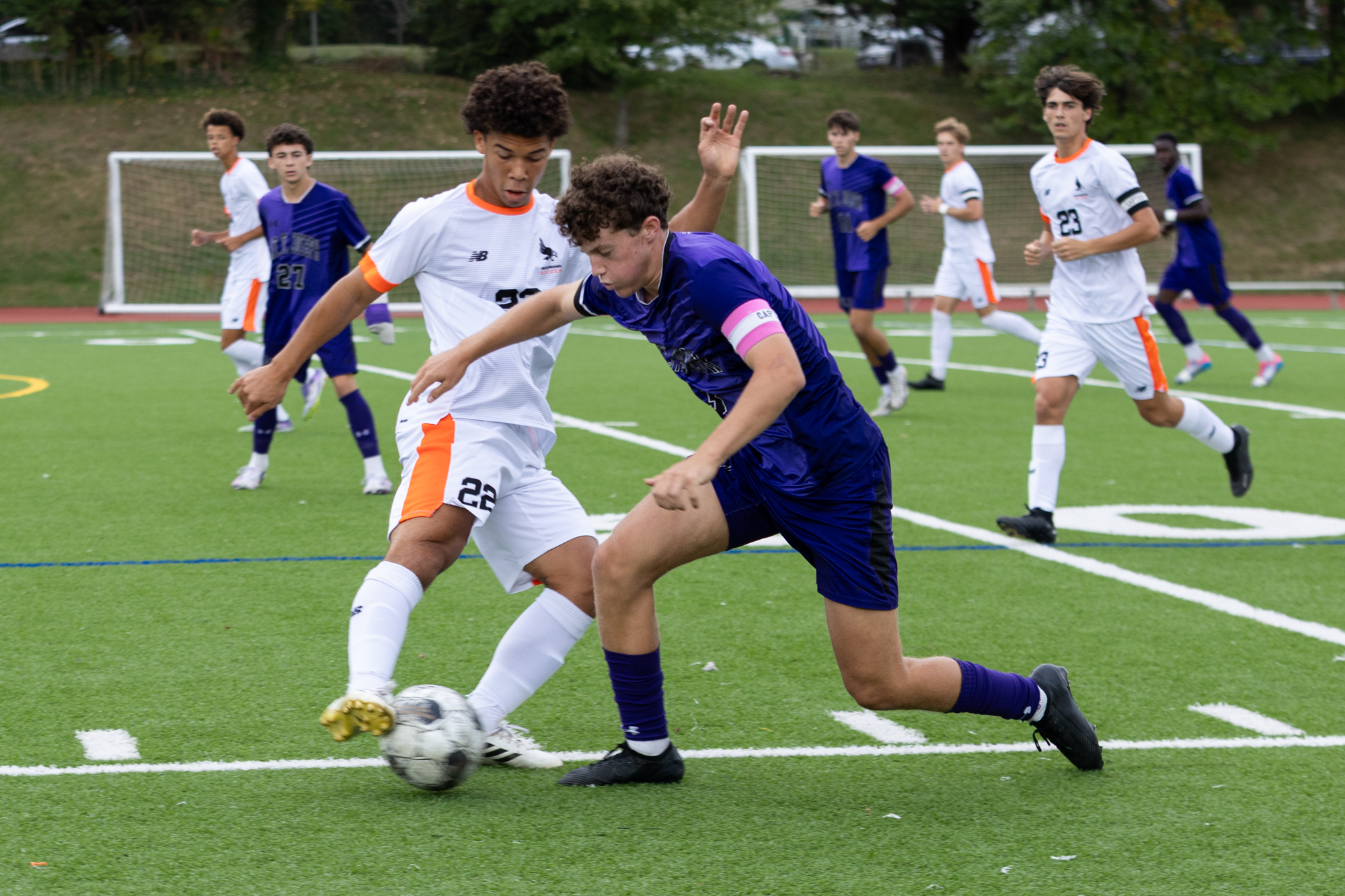 Mount Saint Joseph’s Kameron Madison charges through William Ashley during...