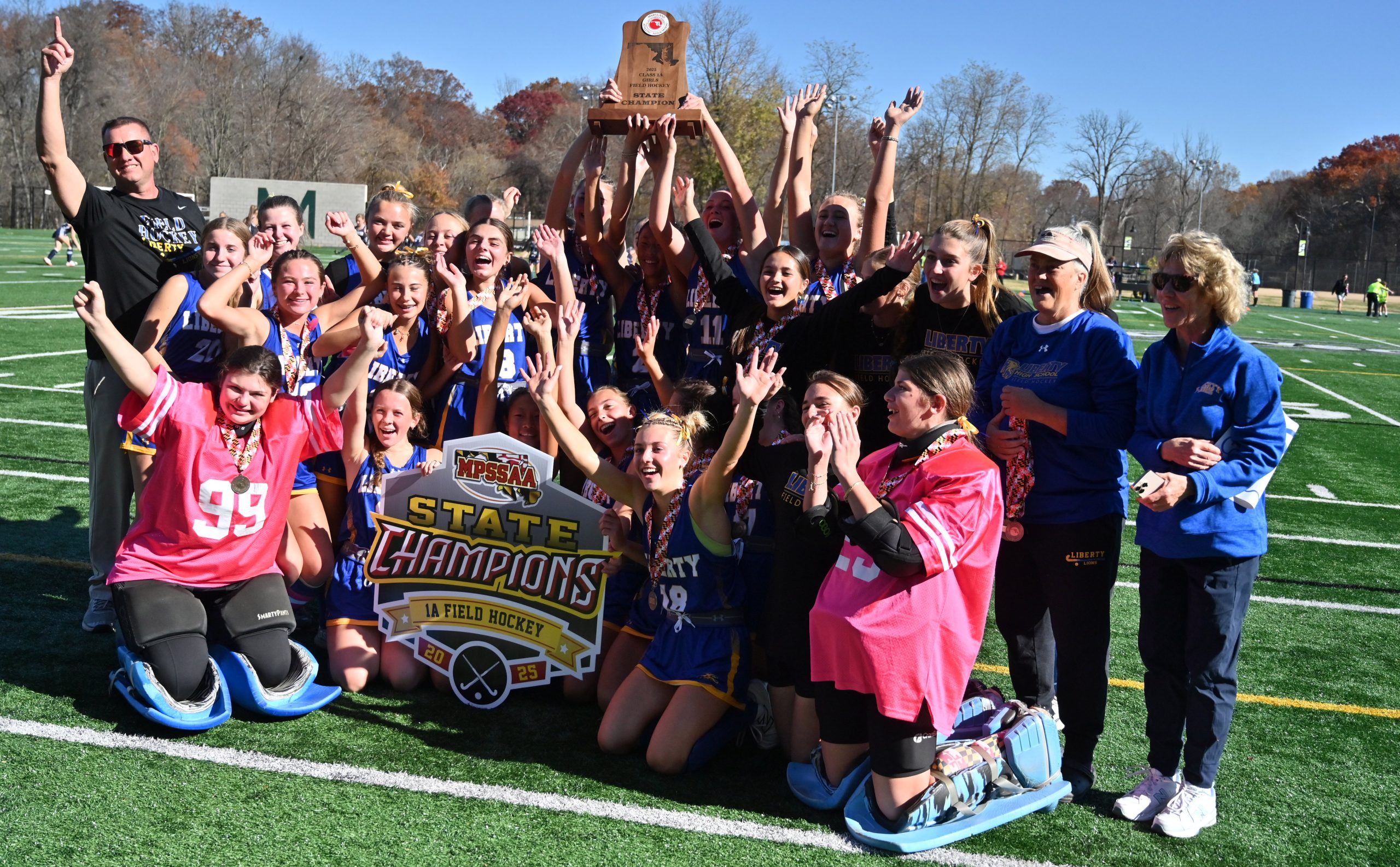 Liberty's field hockey team celebrates their win over Fallston during...