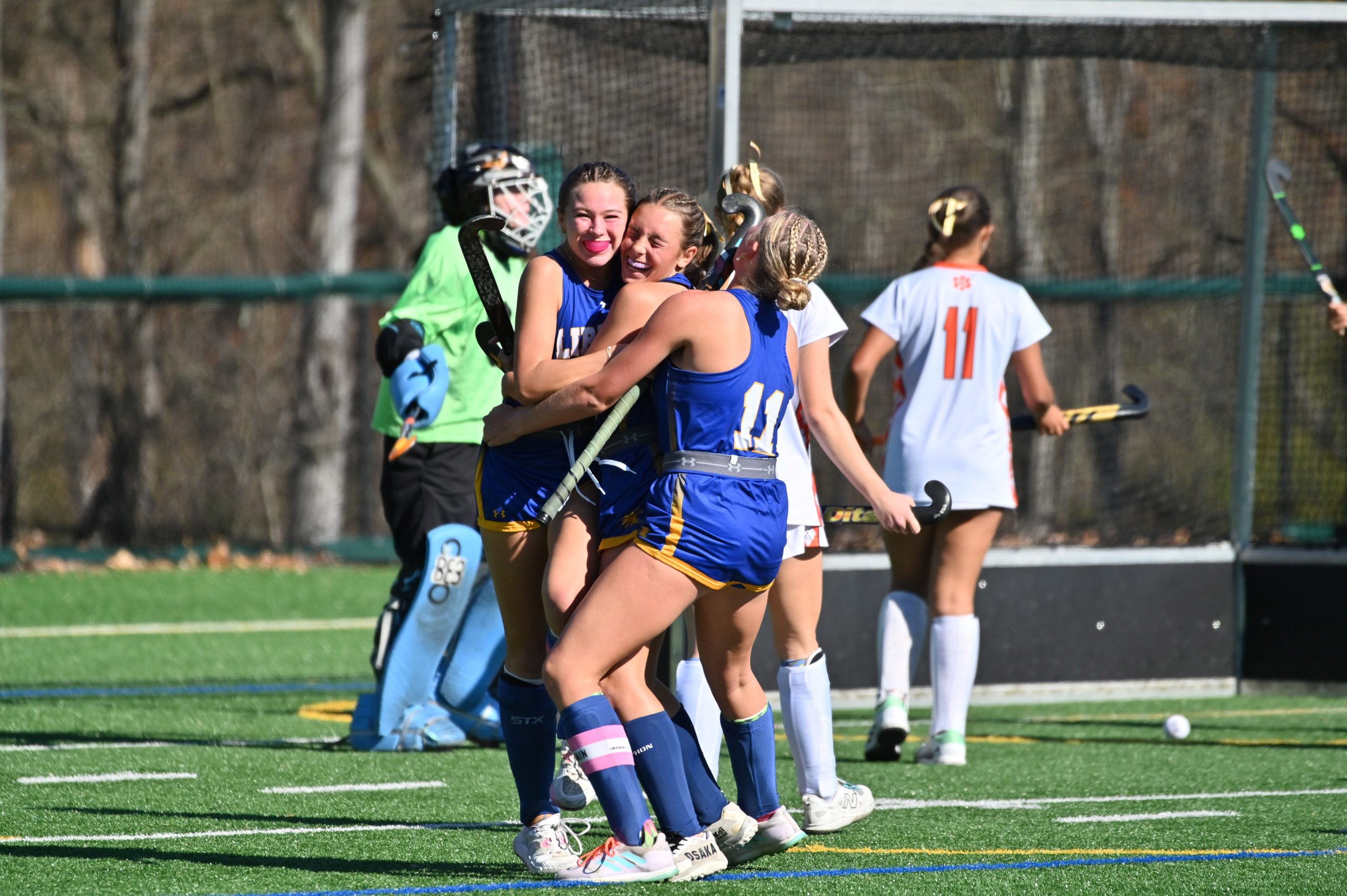 Liberty players celebrate a third quarter goal against Fallston during...