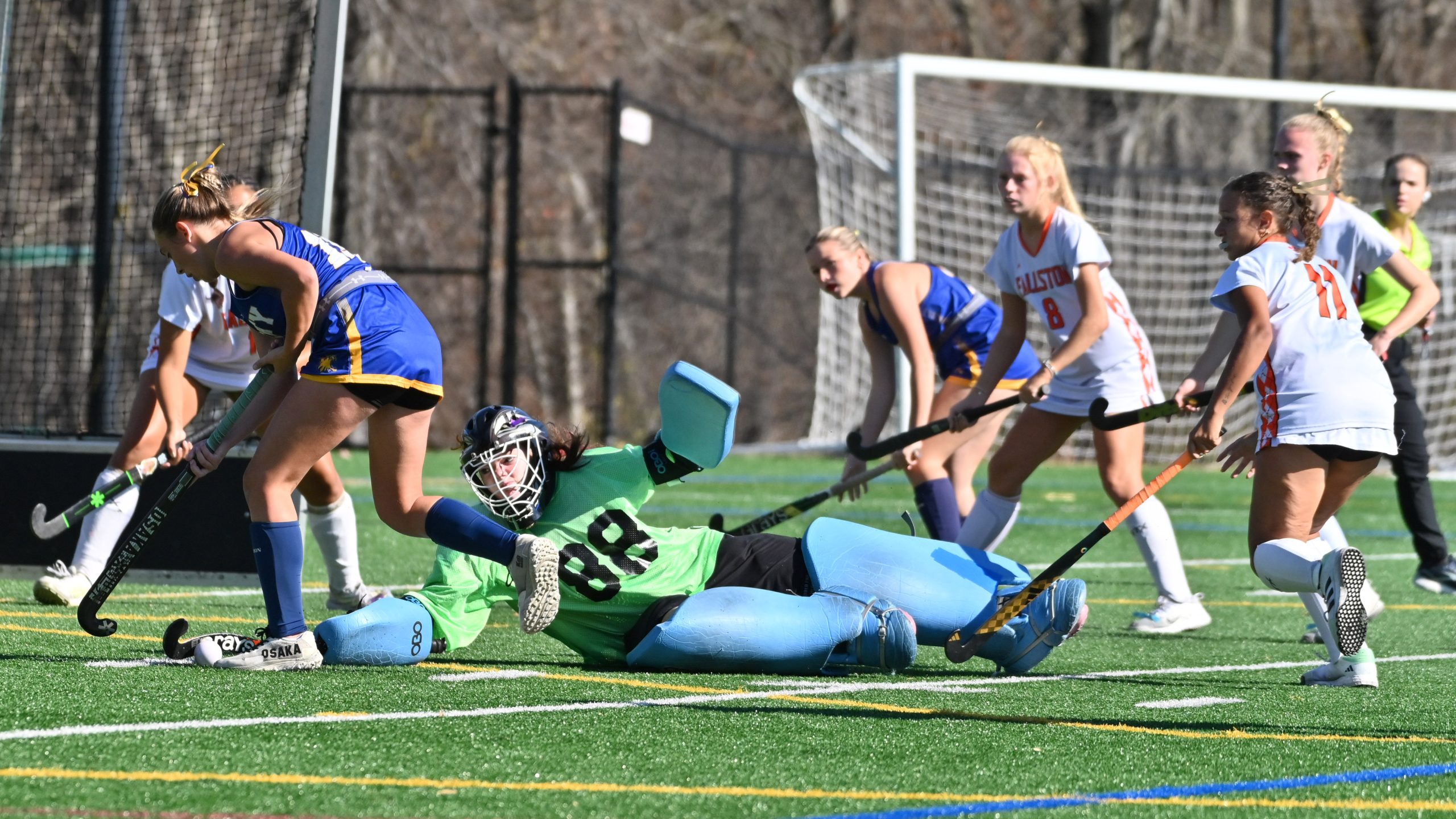 Fallston goalie Auggie McCarthy makes a diving attempt to stop...