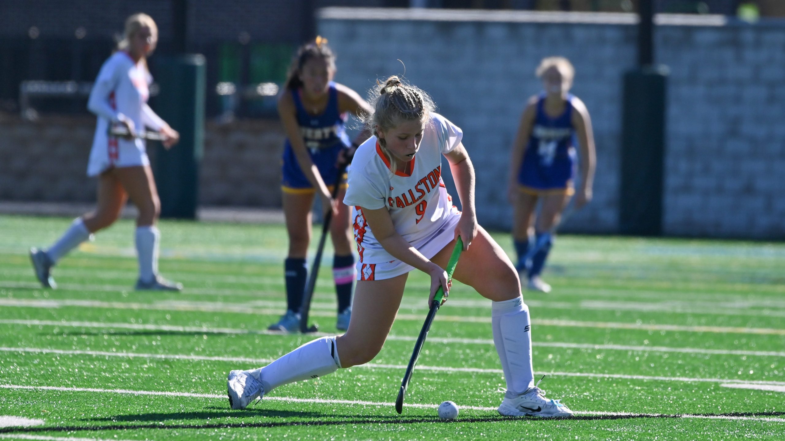 Fallston's Reagan Stevens makes a play on the ball against...