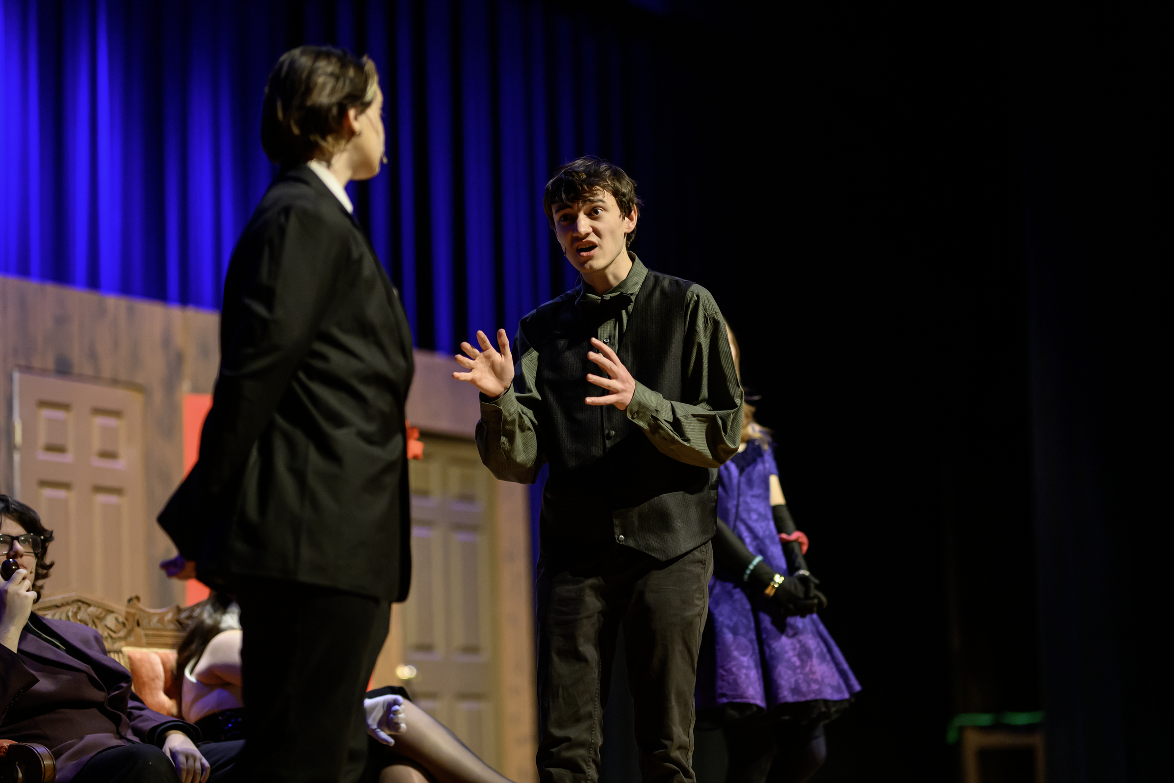 Mr. Green, played by Reed Diffenderfer speaks to the butler...