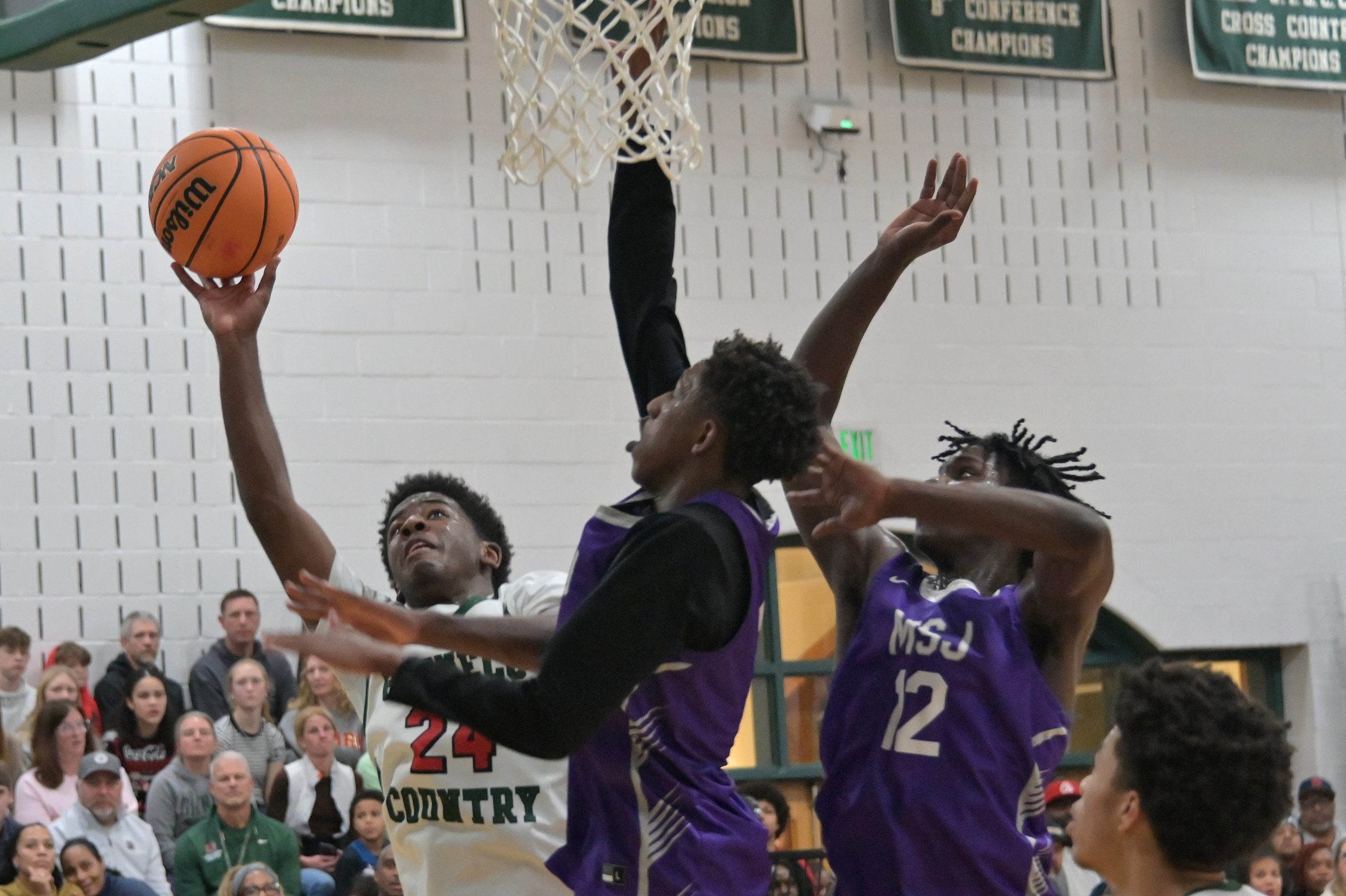 Glenelg âs Jacob Williams scores against Mount St. Joeâs BJ...