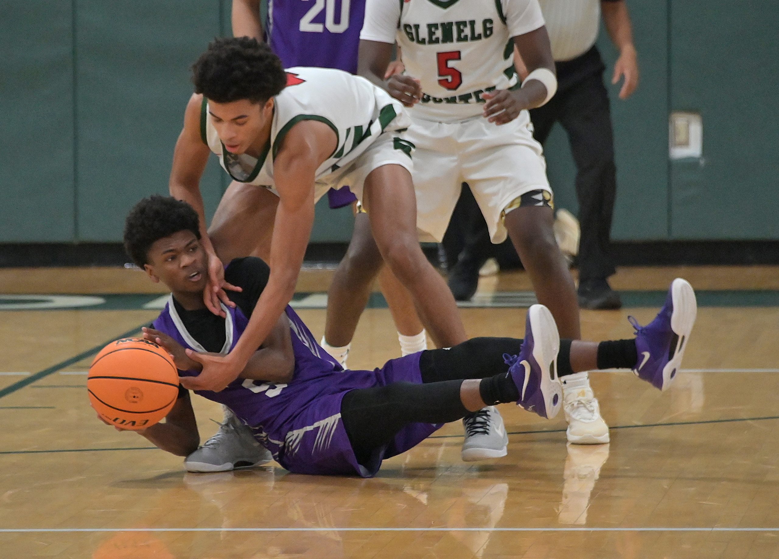 Mount St. Joeâs Chauncey Word gains control of a loose...