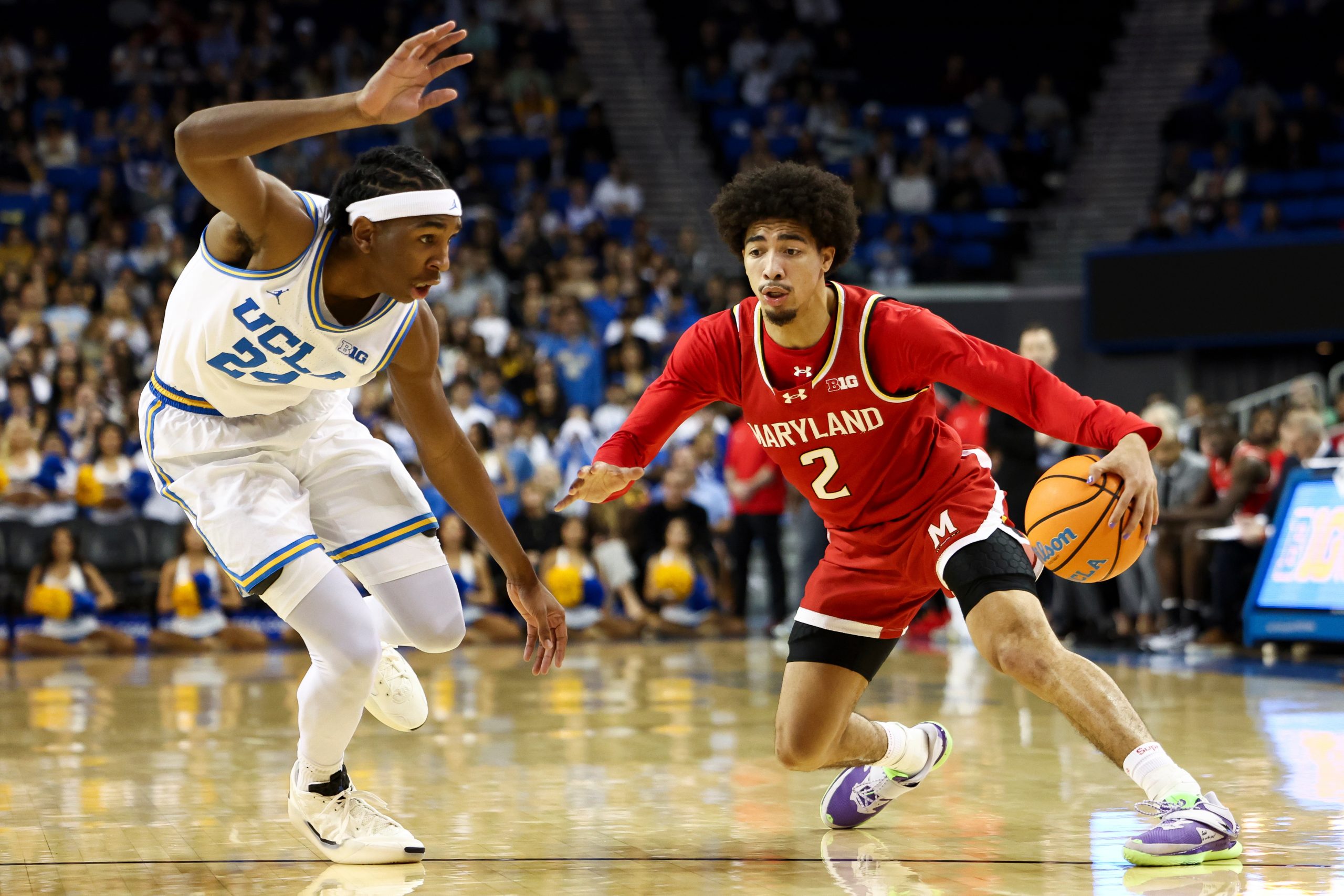 Maryland guard Myles Rice (2) dribbles against UCLA center Steven...