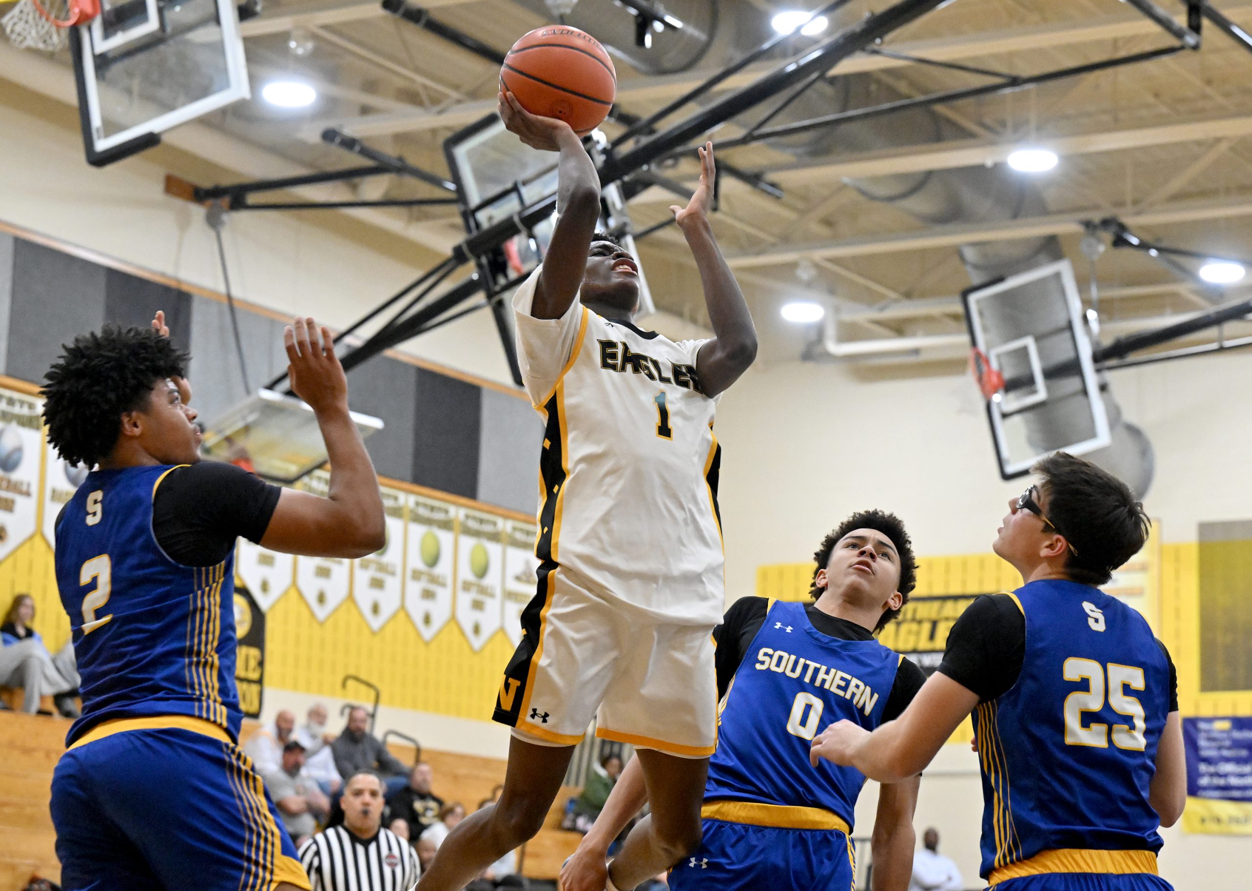 Jan. 06, 2026 Northeast Eagles Bryson Bradley #1 shoots between...