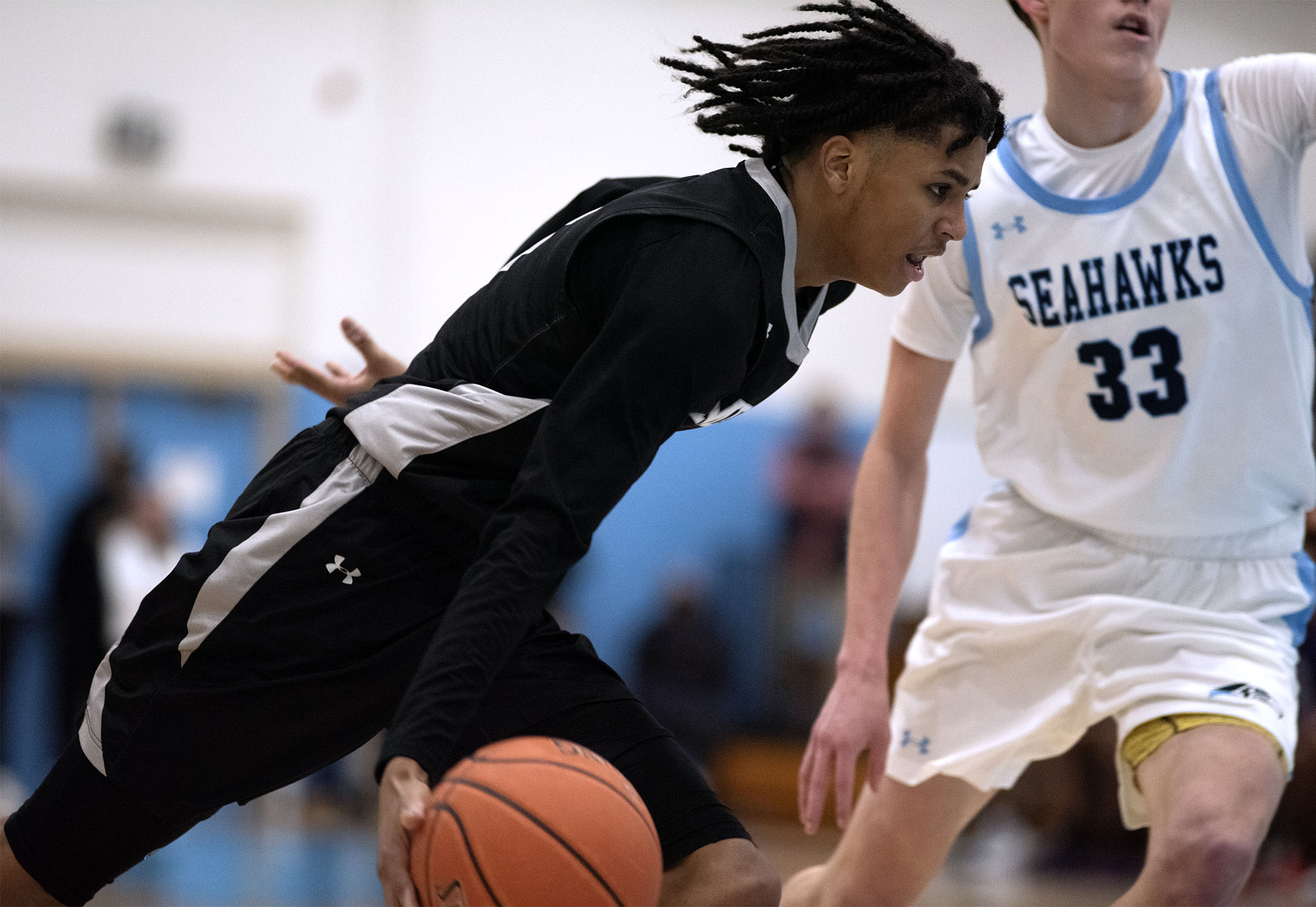 Meade’s Keon Scott drives against South River’s Hank Oxendine during...