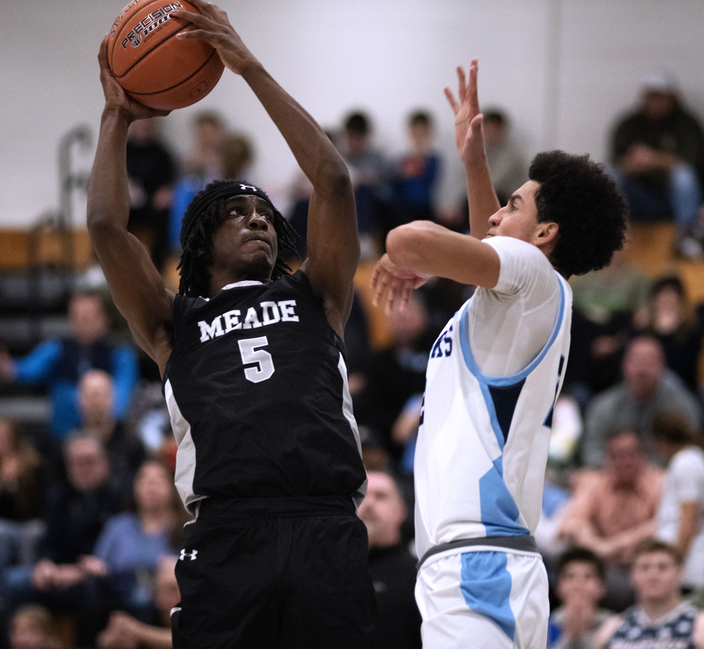 Jan. 16, 2026- Meade’s Jayvon Thomas goes up against South...