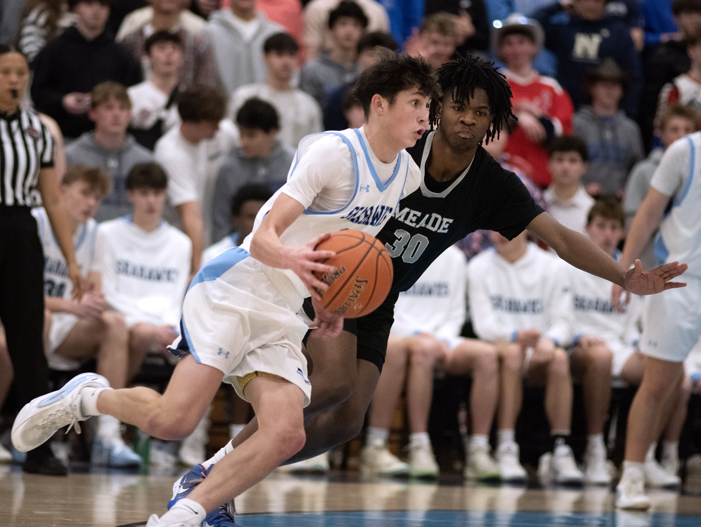 Jan. 16, 2026- South River’s Hank Oxendine moves against Meade’s...