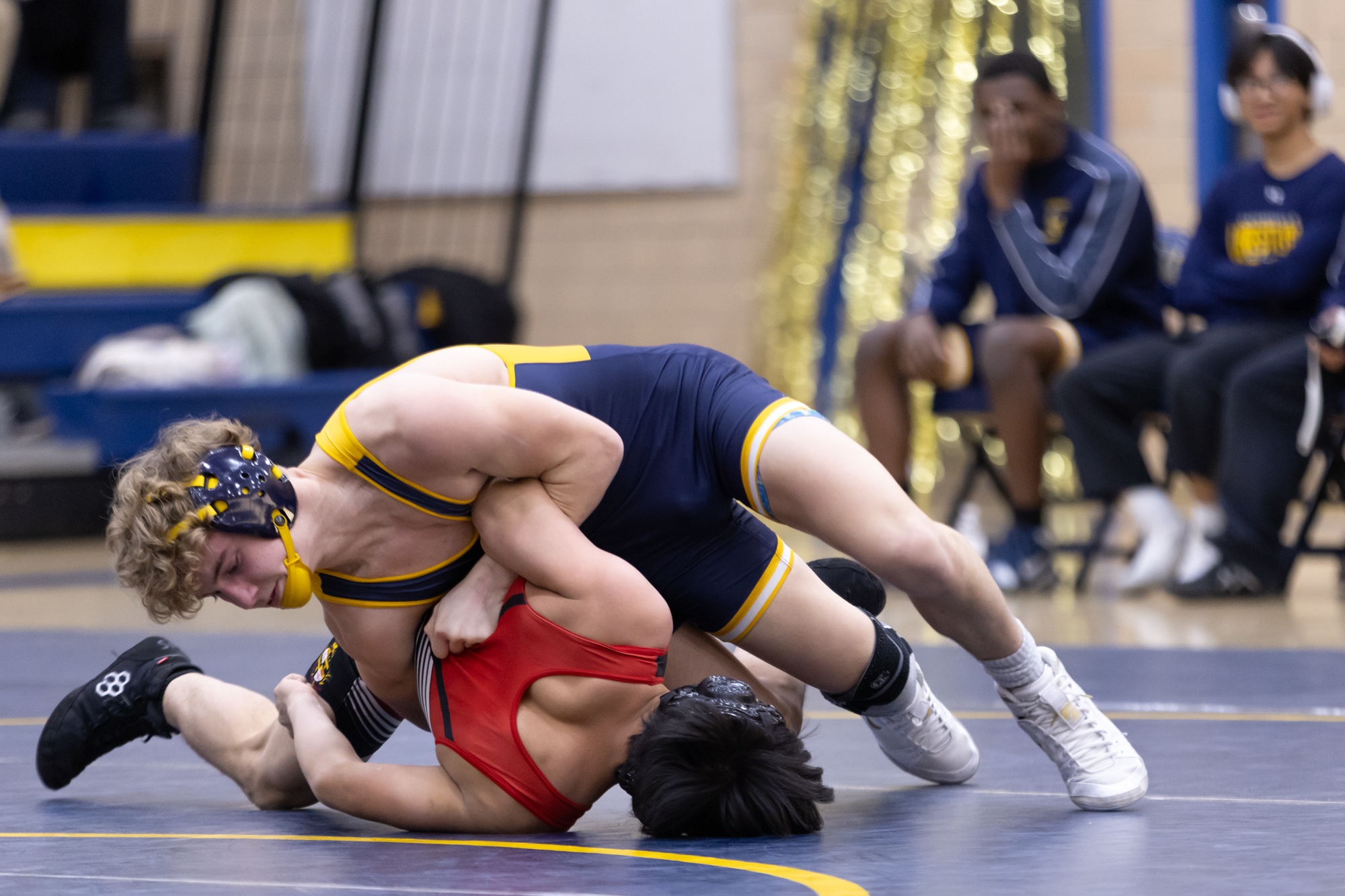 Catonsvilleâs Owen Shelley attempts to pin Bairon Serrano during the...