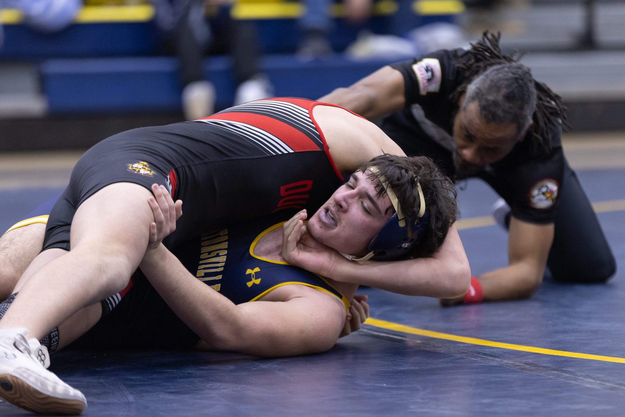 Dulaneyâs Roman Schuler attempts to pin Eric Weedon during the...