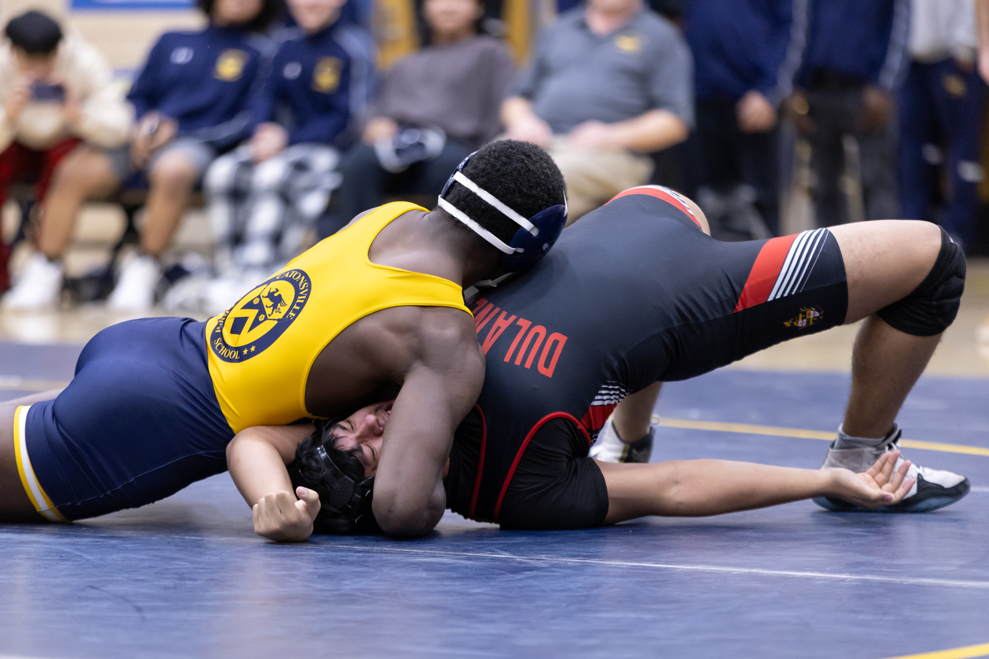 Catonsvilleâs Josh Agen-Davis attempts to pin James Serrano during the...