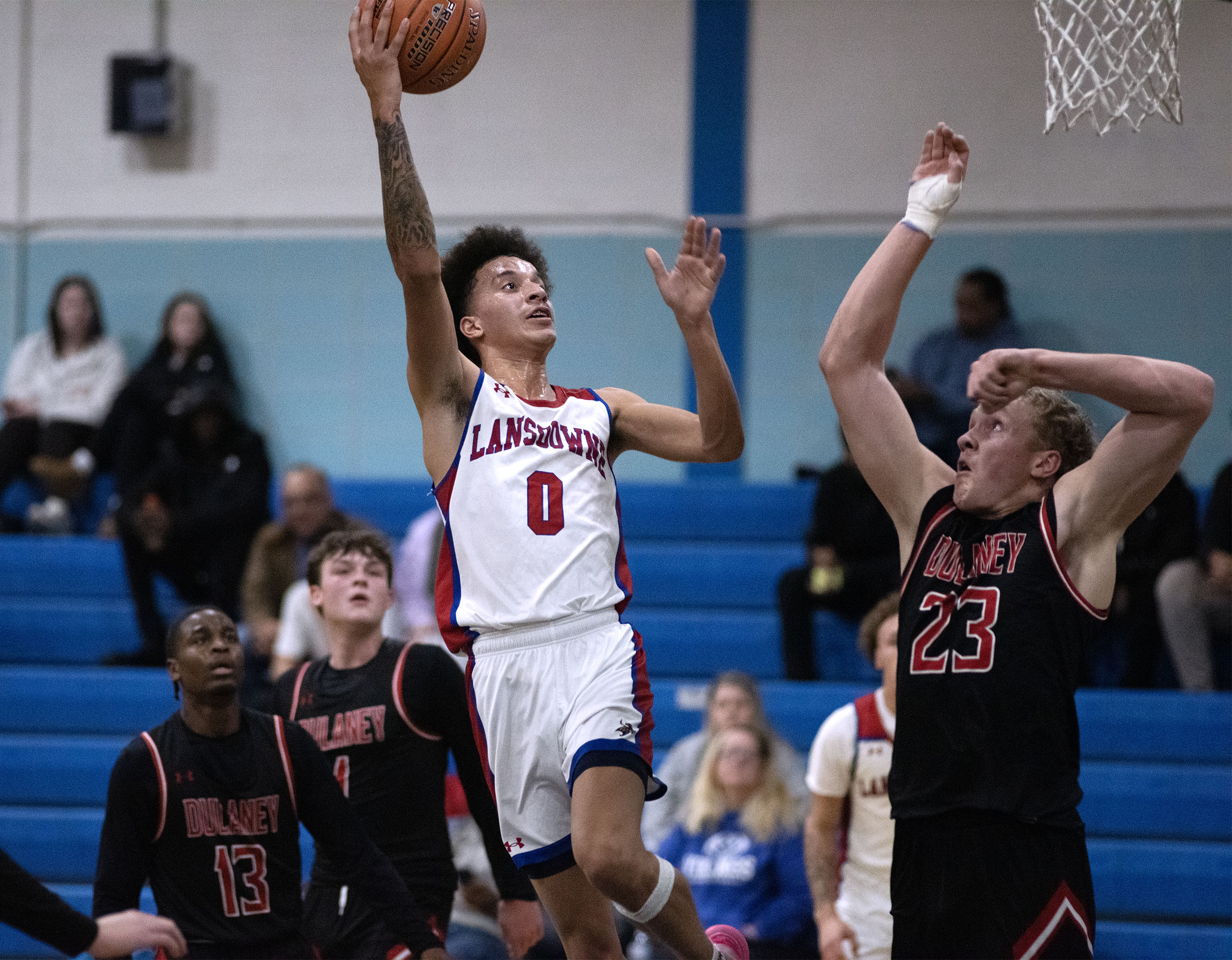 Jan. 7, 2026- Lansdowne's Trevor Howard goes up for a...