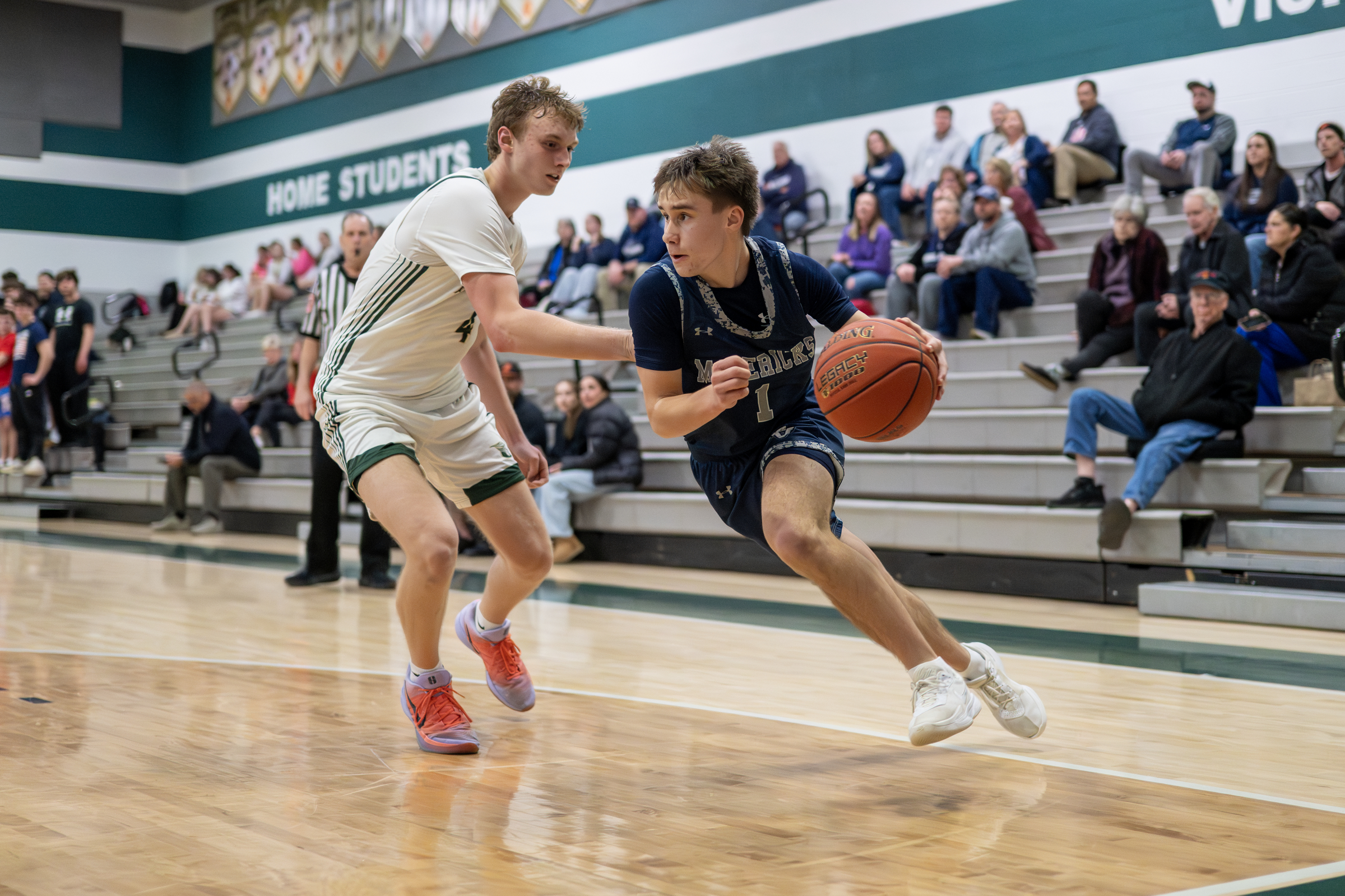 Manchester Valleyâs Lane Saunders drives past Brayden Zmarzly during a...