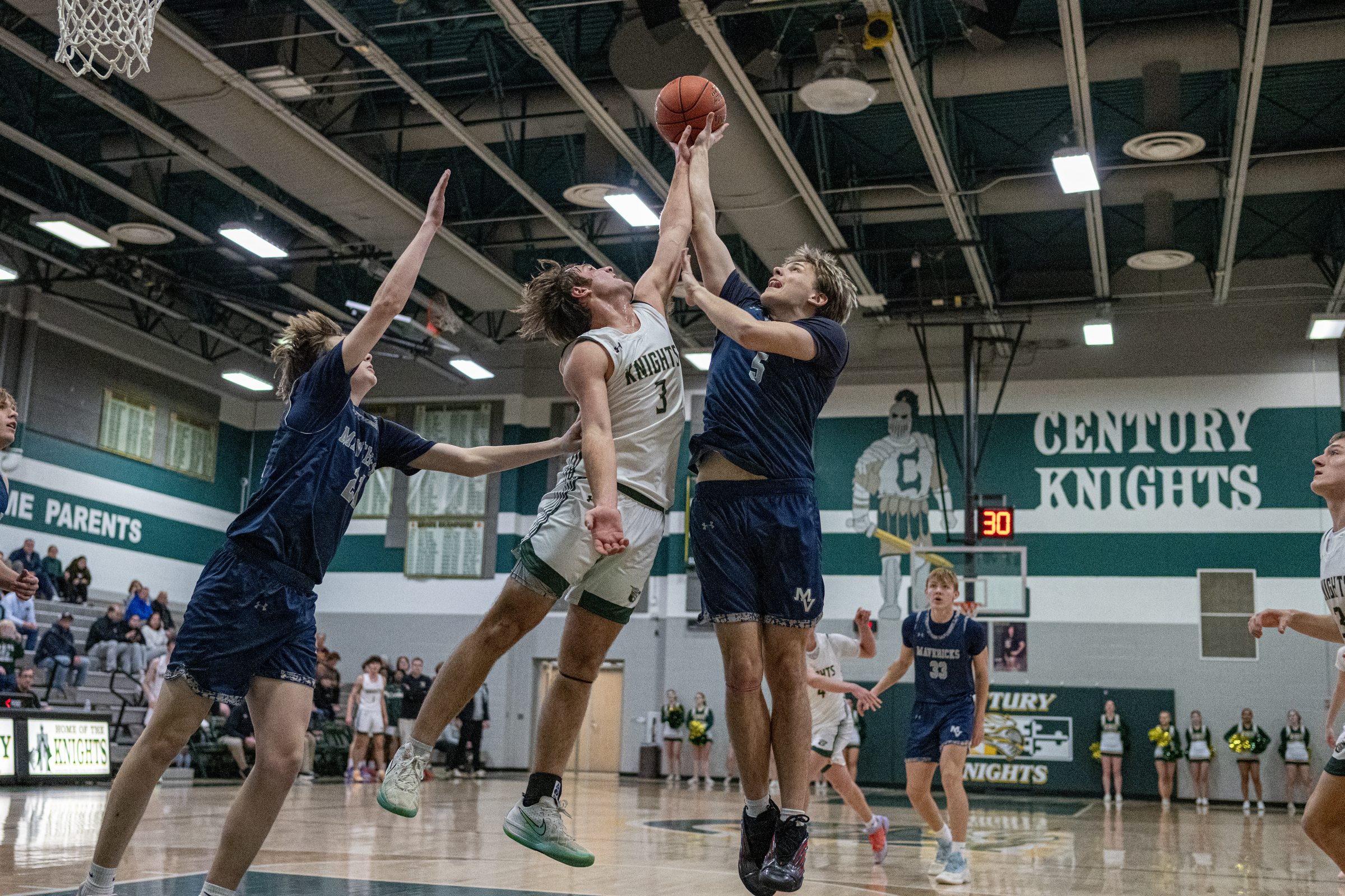 Manchester Valleyâs Hunter Rees tries to shoot the ball over...