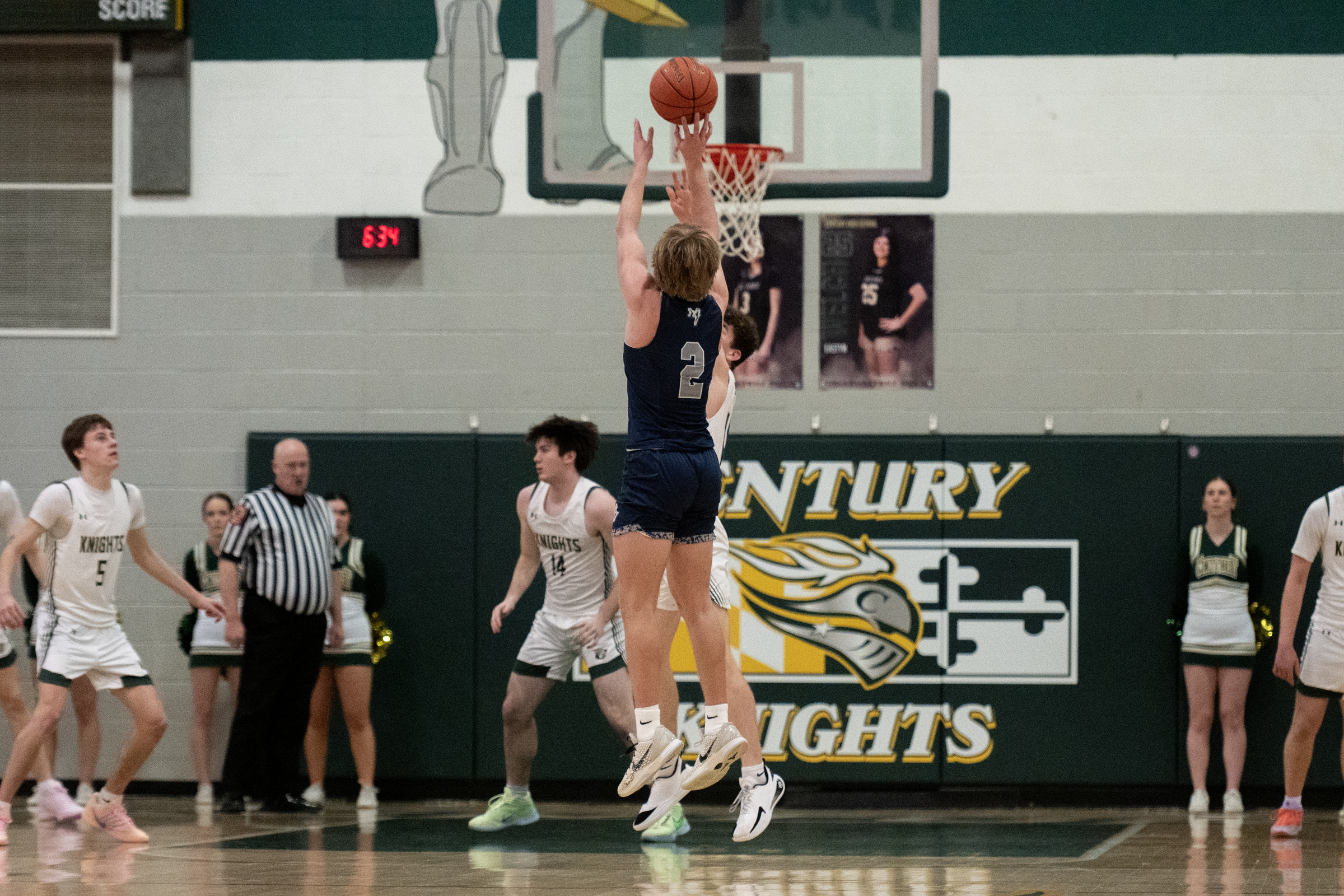 Manchester Valleyâs Colton Enderle sinks a three-pointer during a basketball...