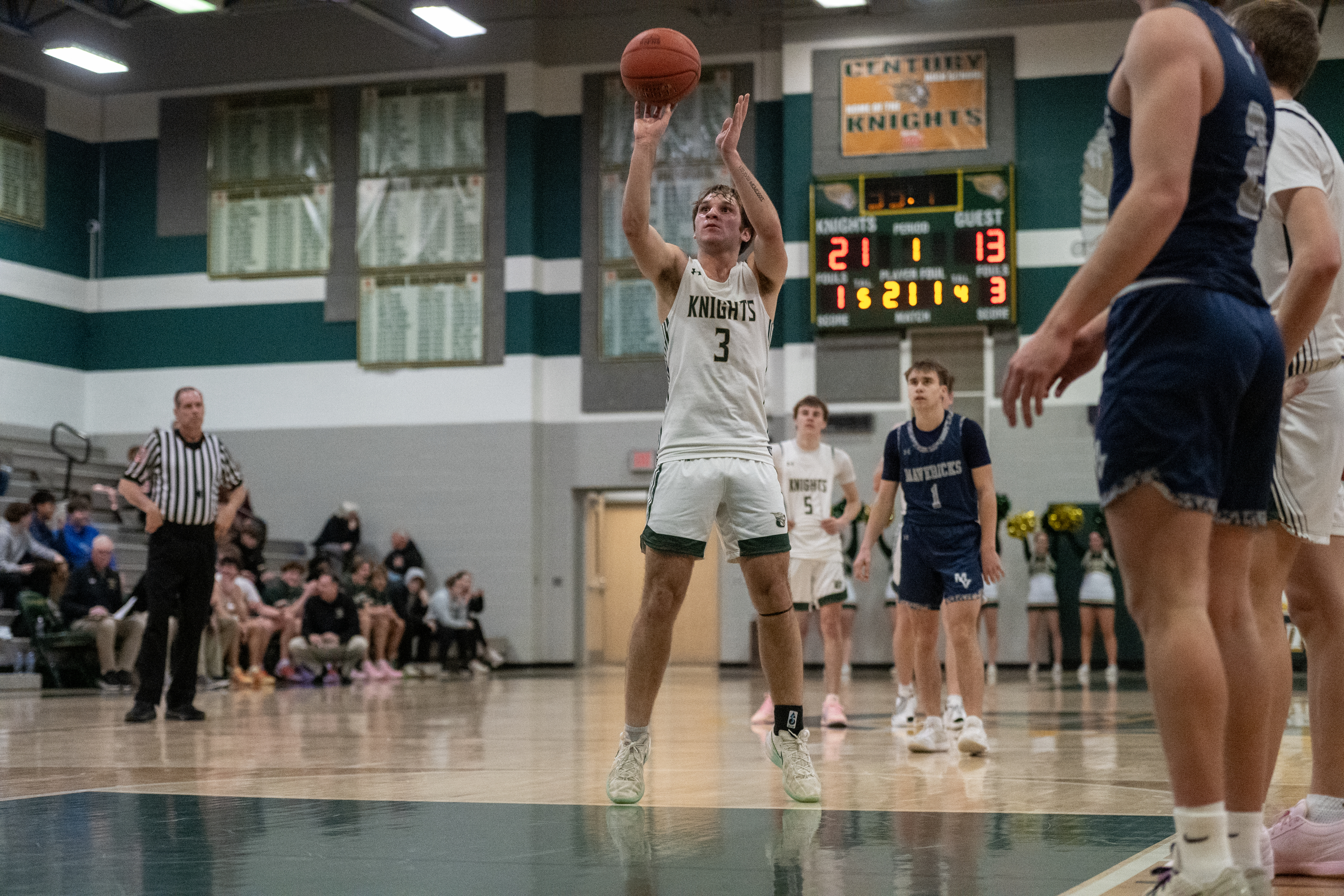 Braden Davis shoots a free throw during a basketball game...