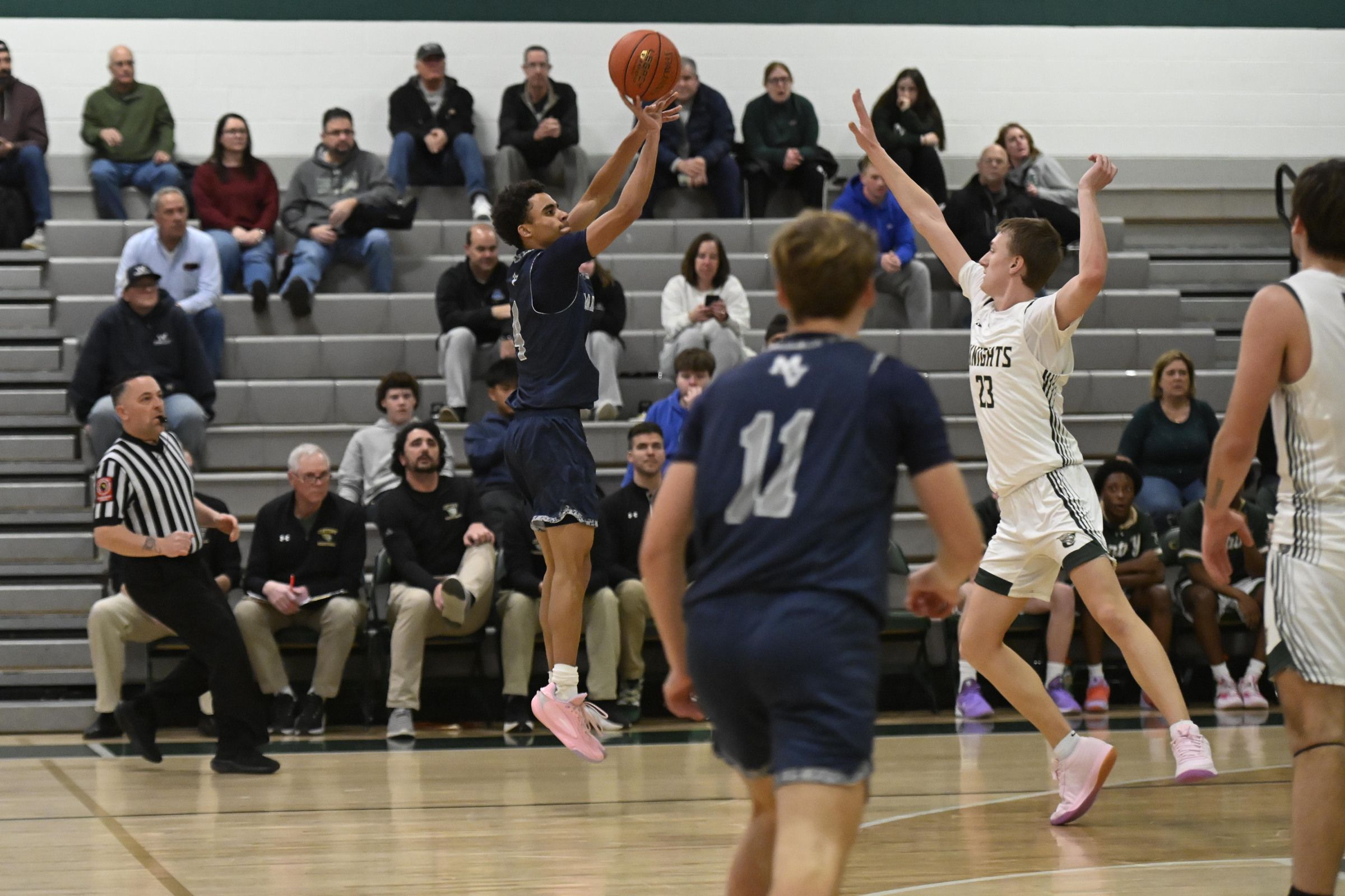 Manchester Valleyâs Trevor Hottenstein sinks a three-pointer after stealing the...