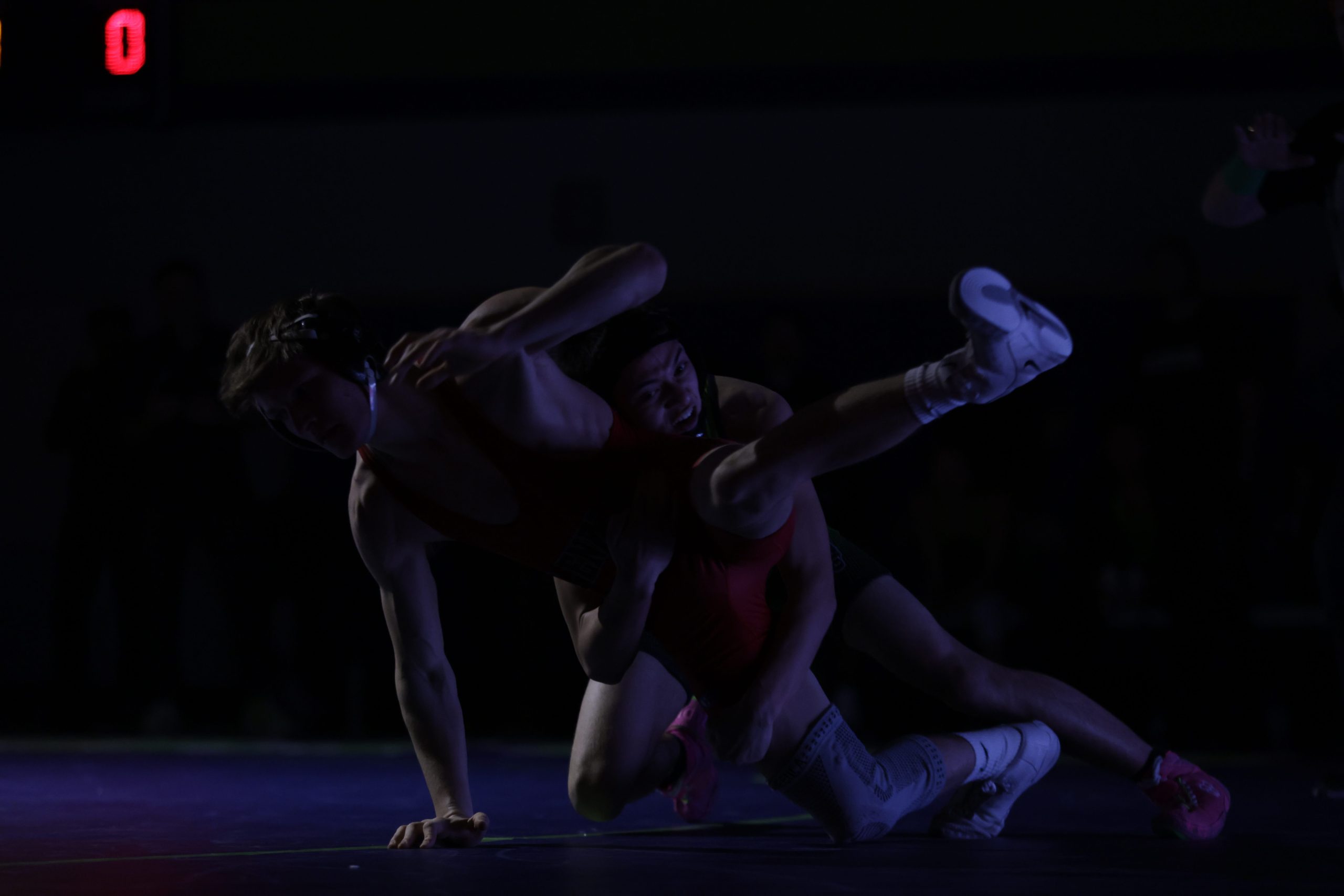 Guilford Parkâs Ethan Brancazio pushes Quinn Hartner back into the...