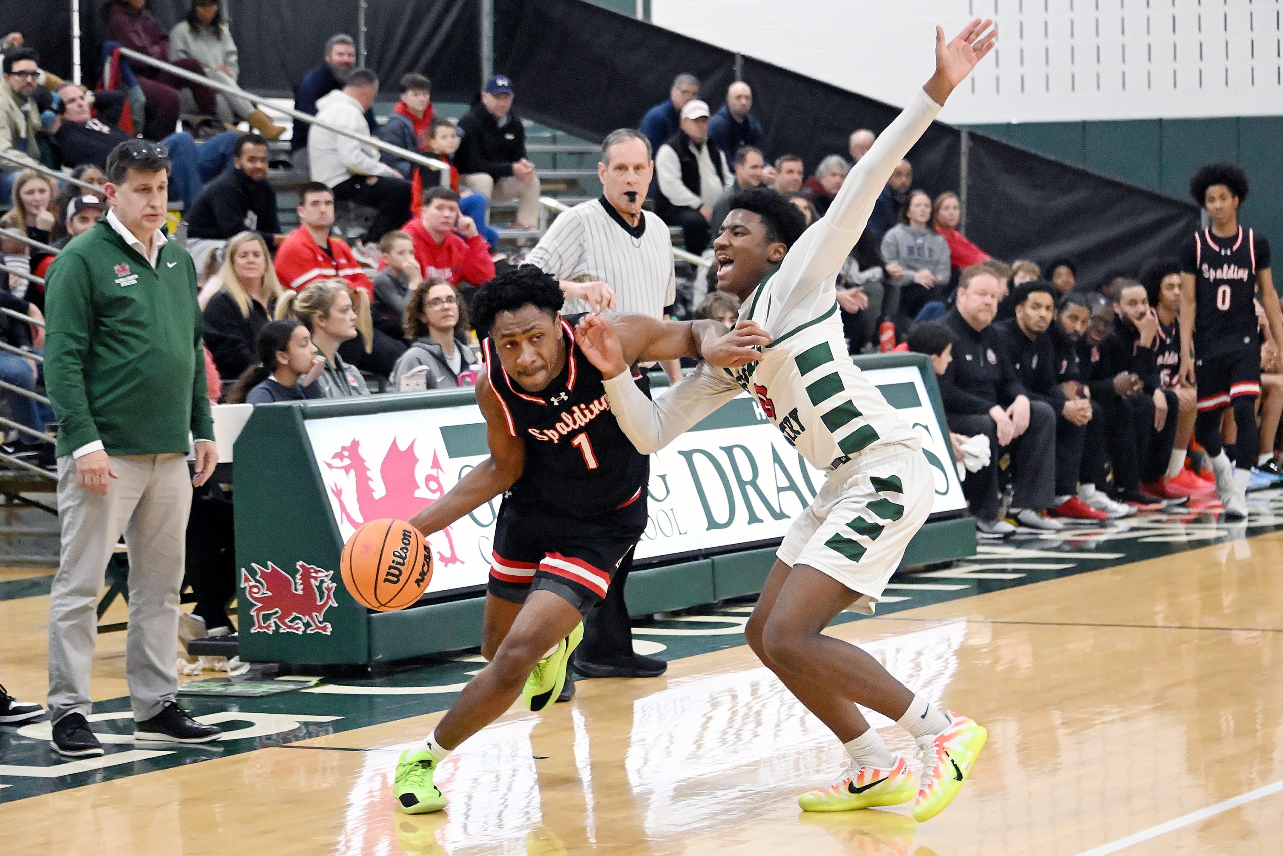 Spaldingâs Terrence Moultrie drives to the basket as Glenelgâs Kayden...
