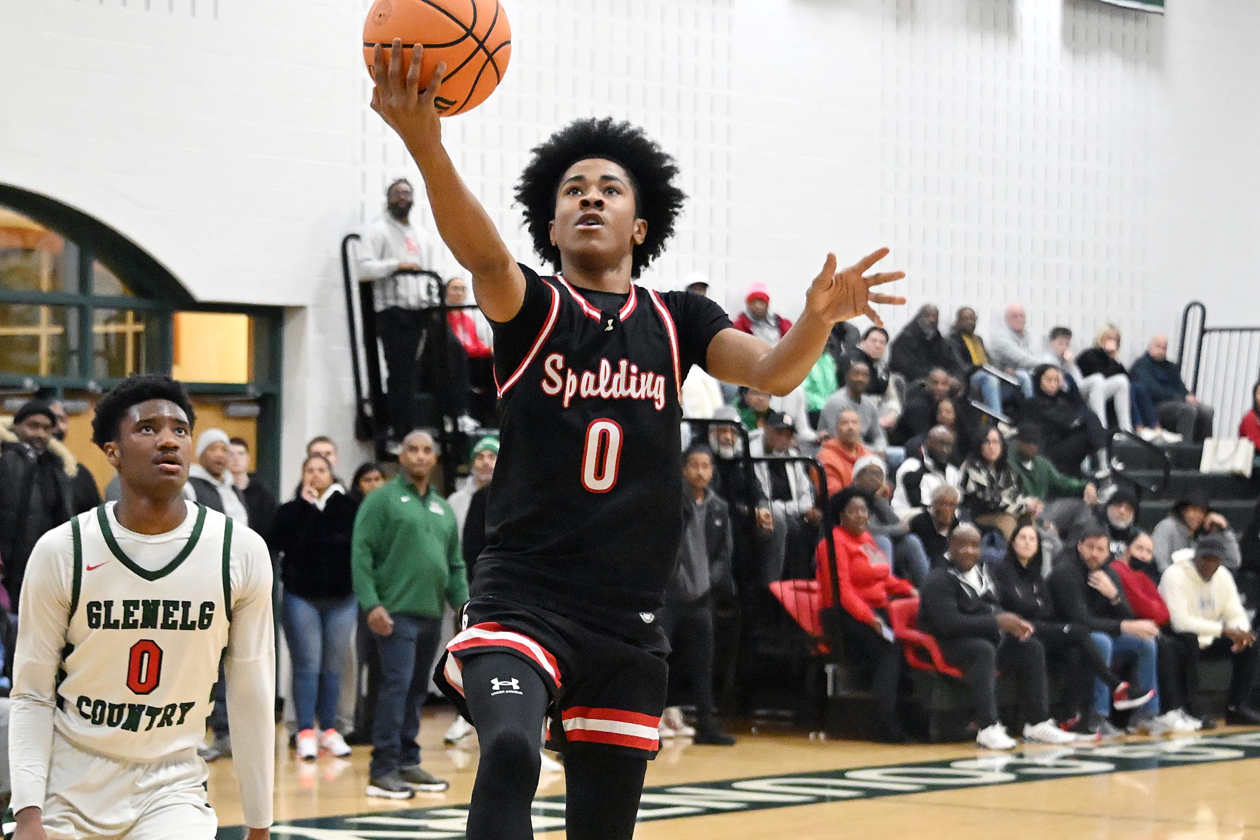 Glenelg Countryâs Kayden Leggett watches Spaldingâs Kameron Carter score a...
