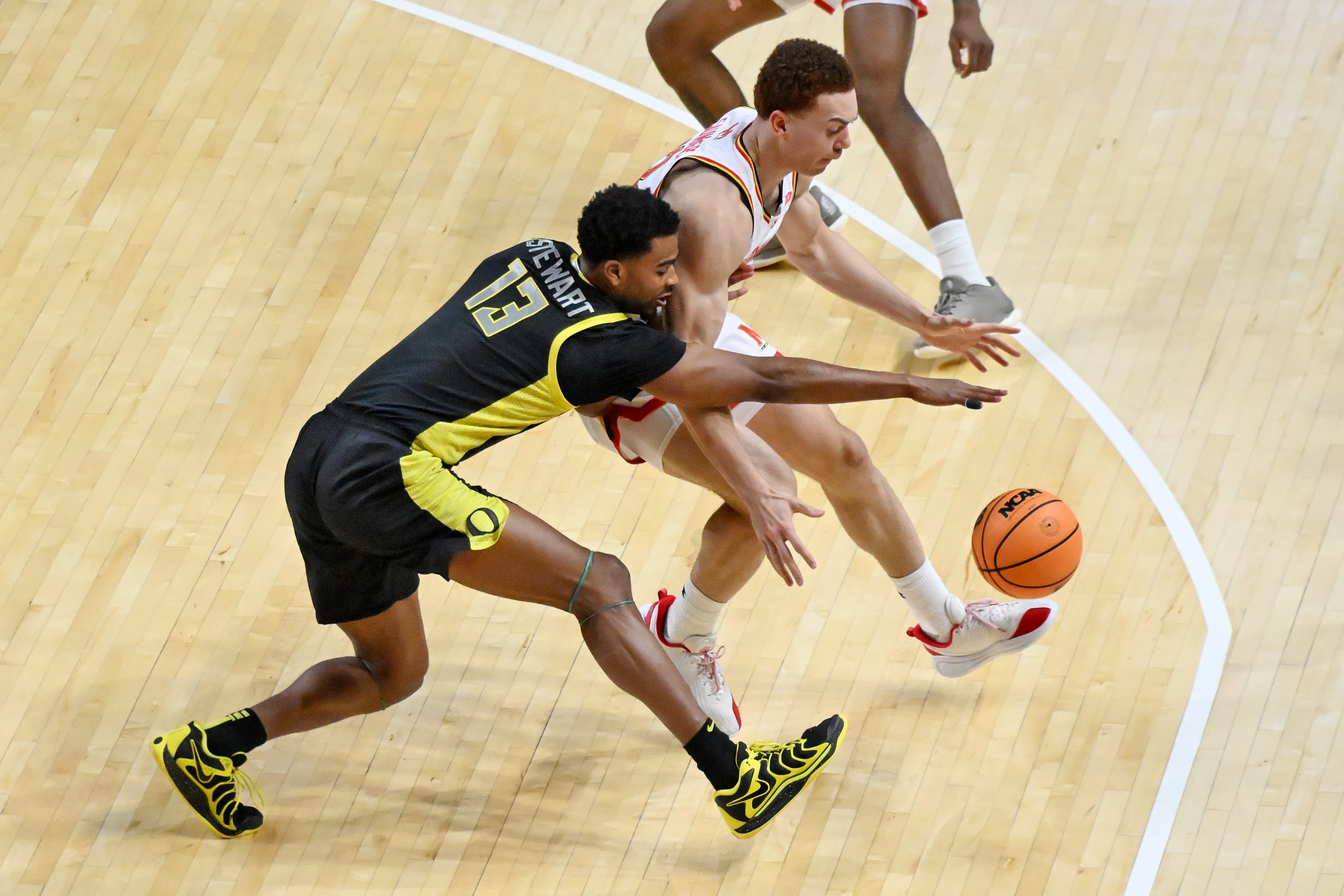Oregonâs Sean Stewart and Marylandâs Elijah Saunders fight for control...