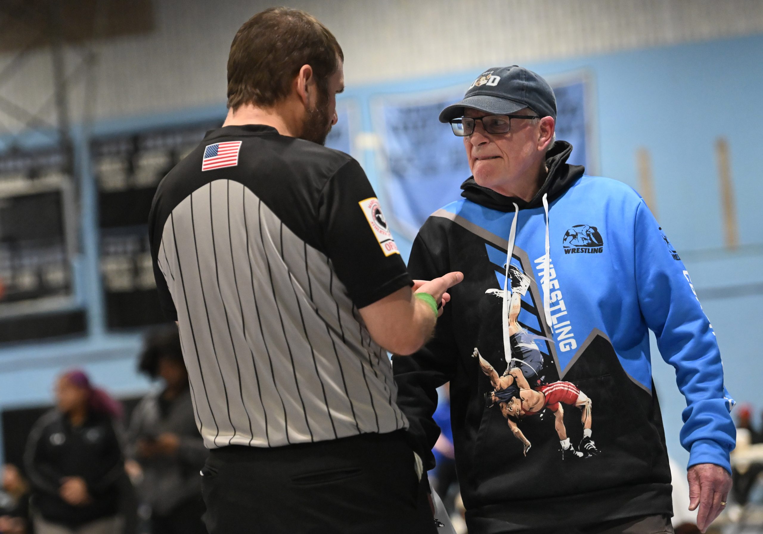 Parkville wrestling head coach Desi McNelis gets clarification on a...