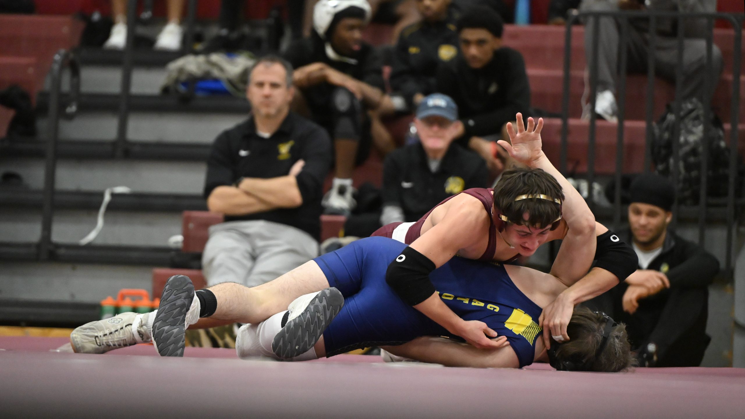 Towson's Korben Suskin tries to pin Perry Hall's Trevor Scott...