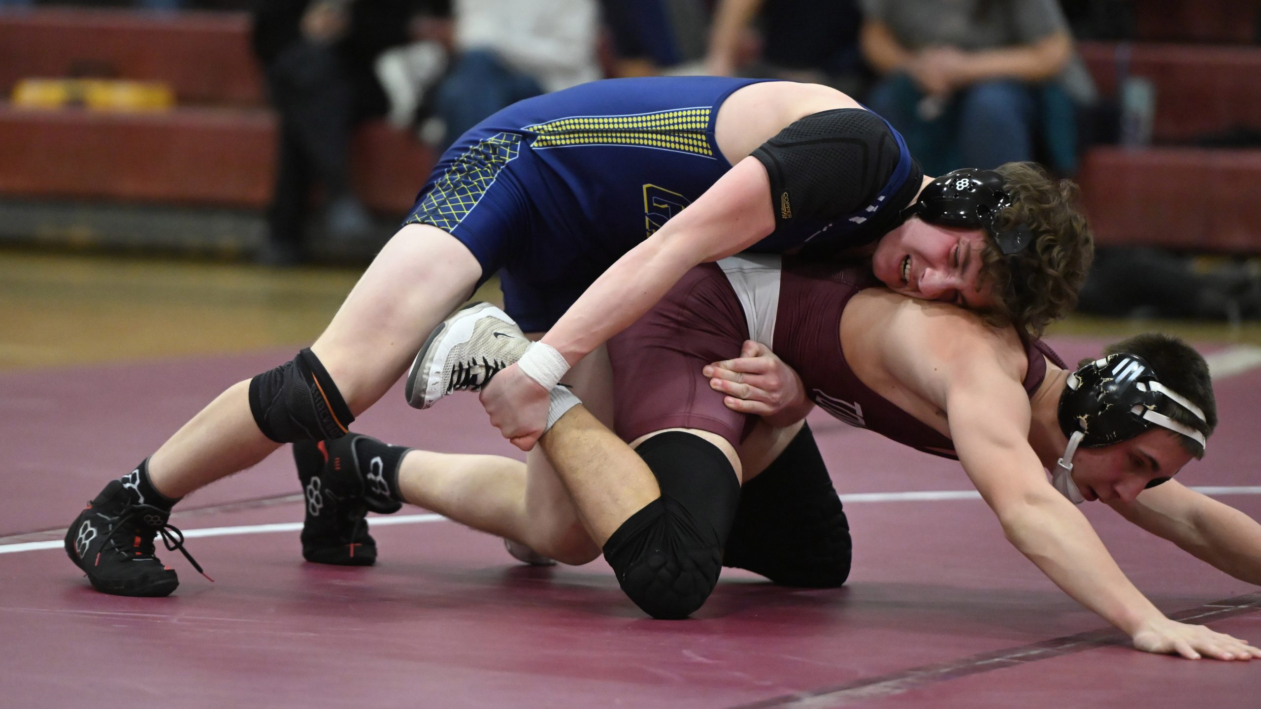 Perry Hall's Adam Ferrante controls Towson's Will Witherspoon in the...