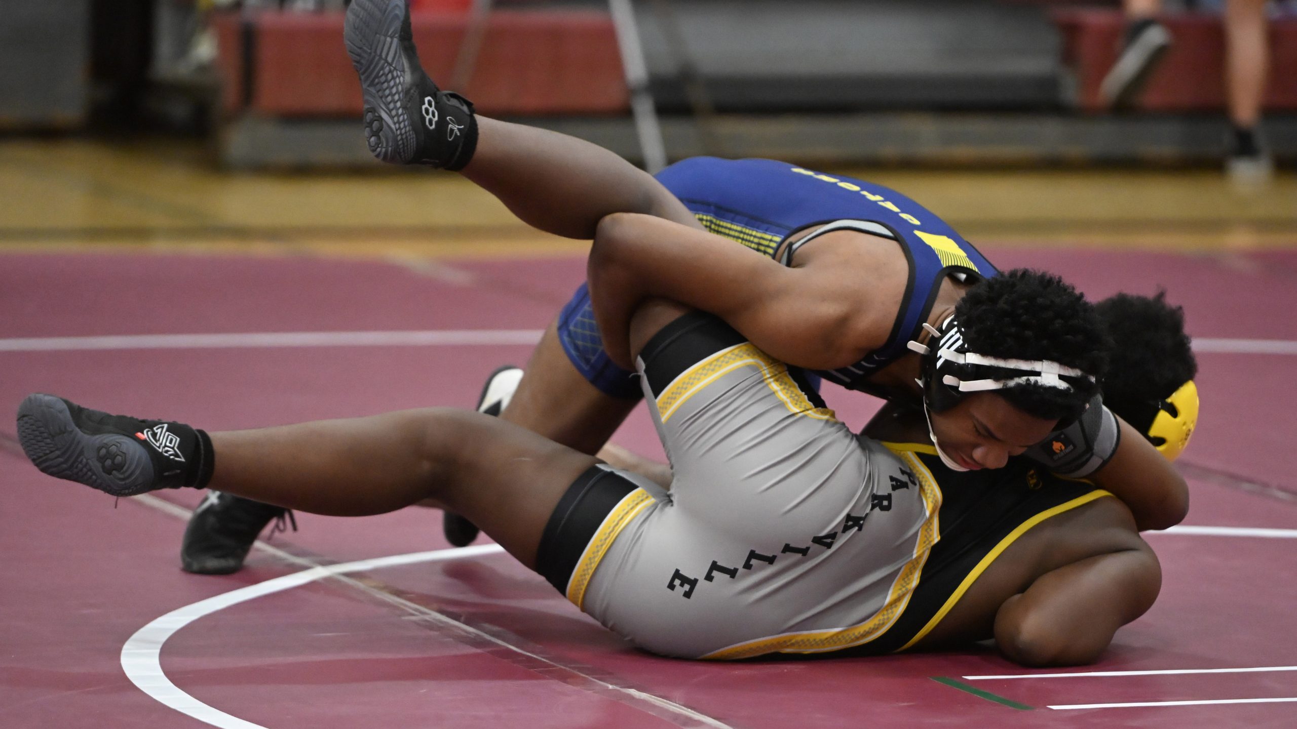 Perry Hall's Artavien Tubman tries to put Parkville's Barron Johnson...