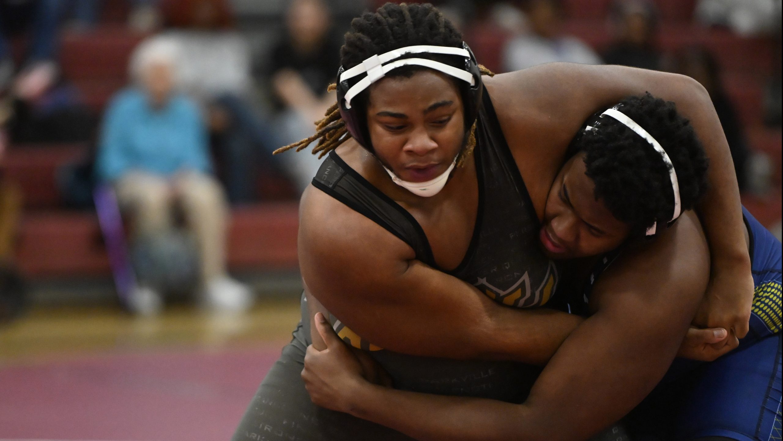 Parkville's Kris Lloyd and Perry Hall's Ayden McCain battle in...