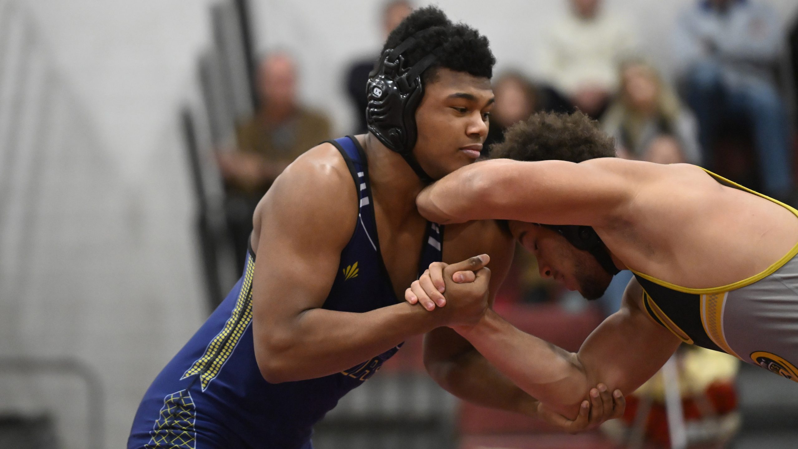 Perry Hall's Victor Marks Jenkins battles Parkville's Jakai Corsnitz in...