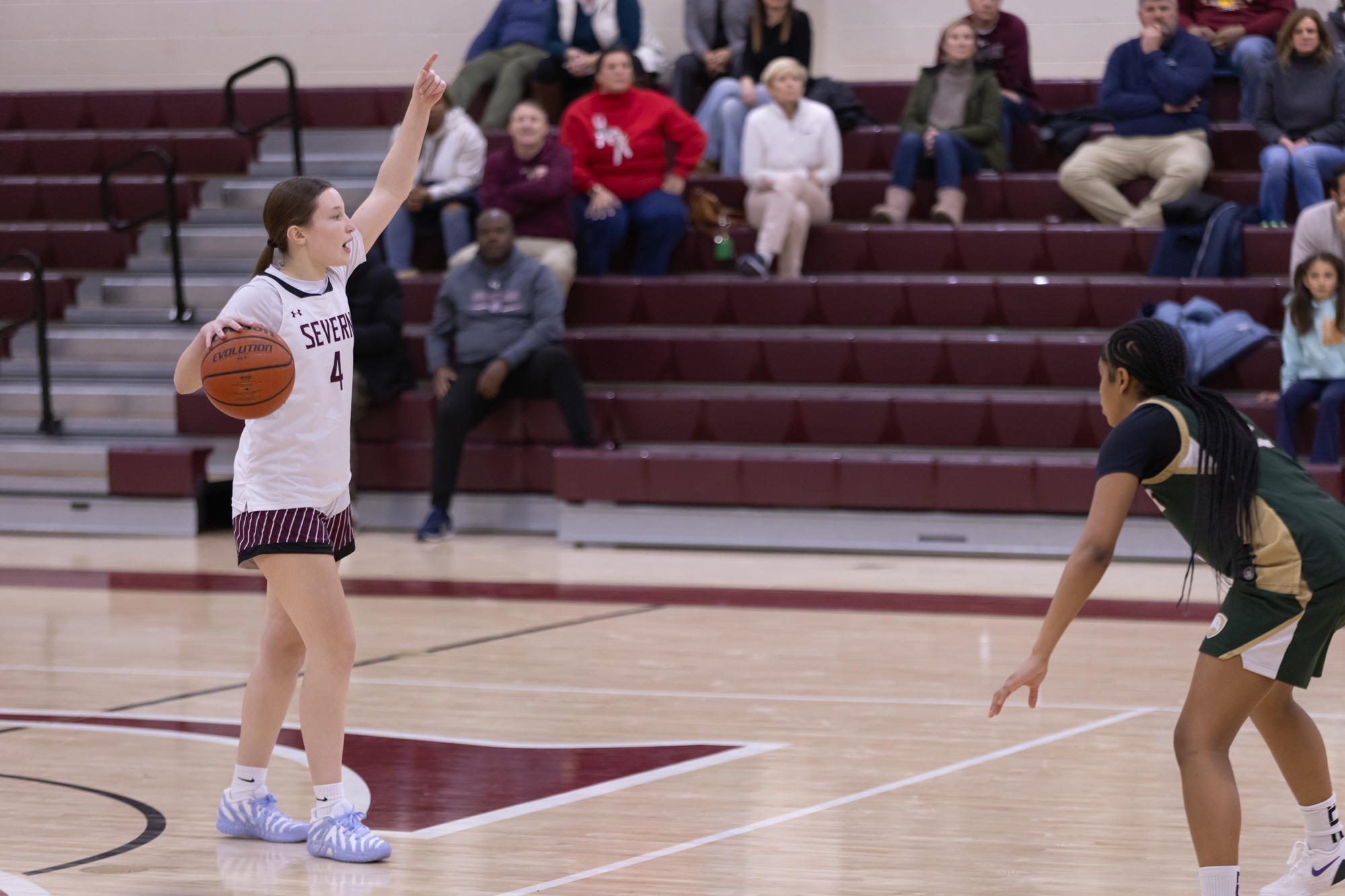 Severnâs Kendall Austin calls a play during the game between...