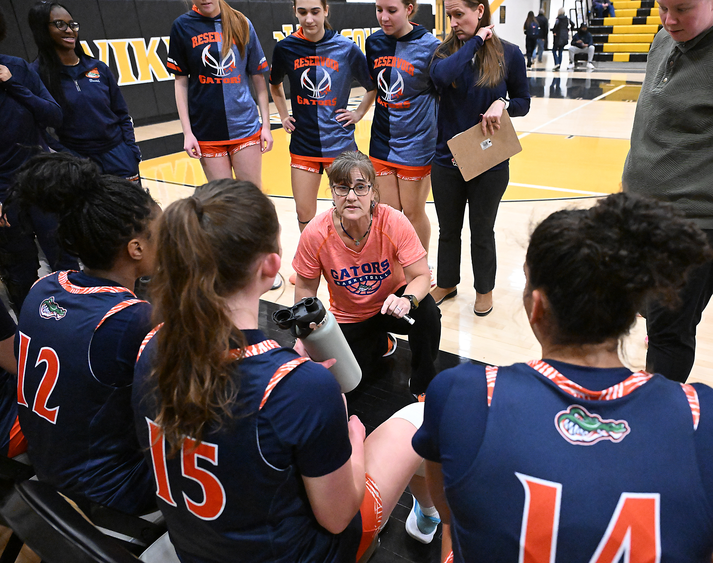 Reservoir girls basketball coach, Deb Taylor during a timeout in...